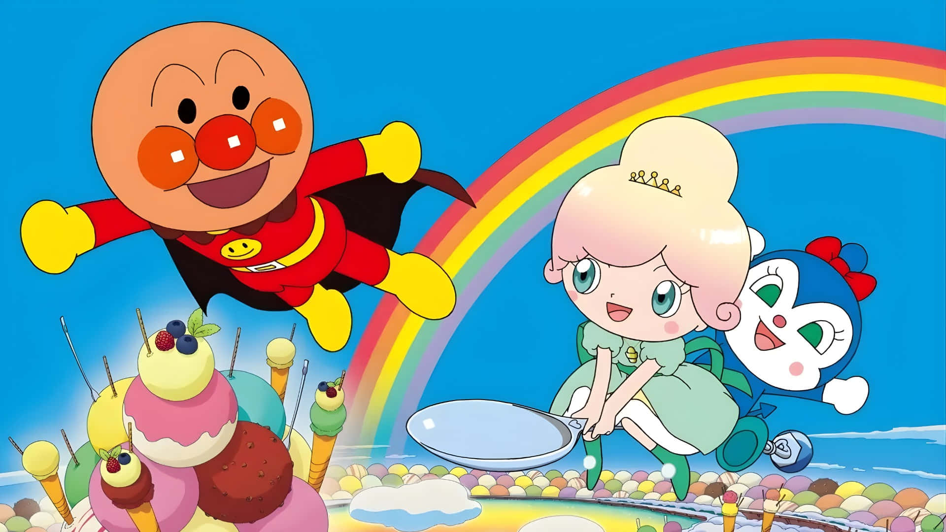  壁紙 — Anpanman 和朋友們在明亮的彩虹下，在鮮豔的藍天背景下，歡快地翱翔在糖果景觀之上。