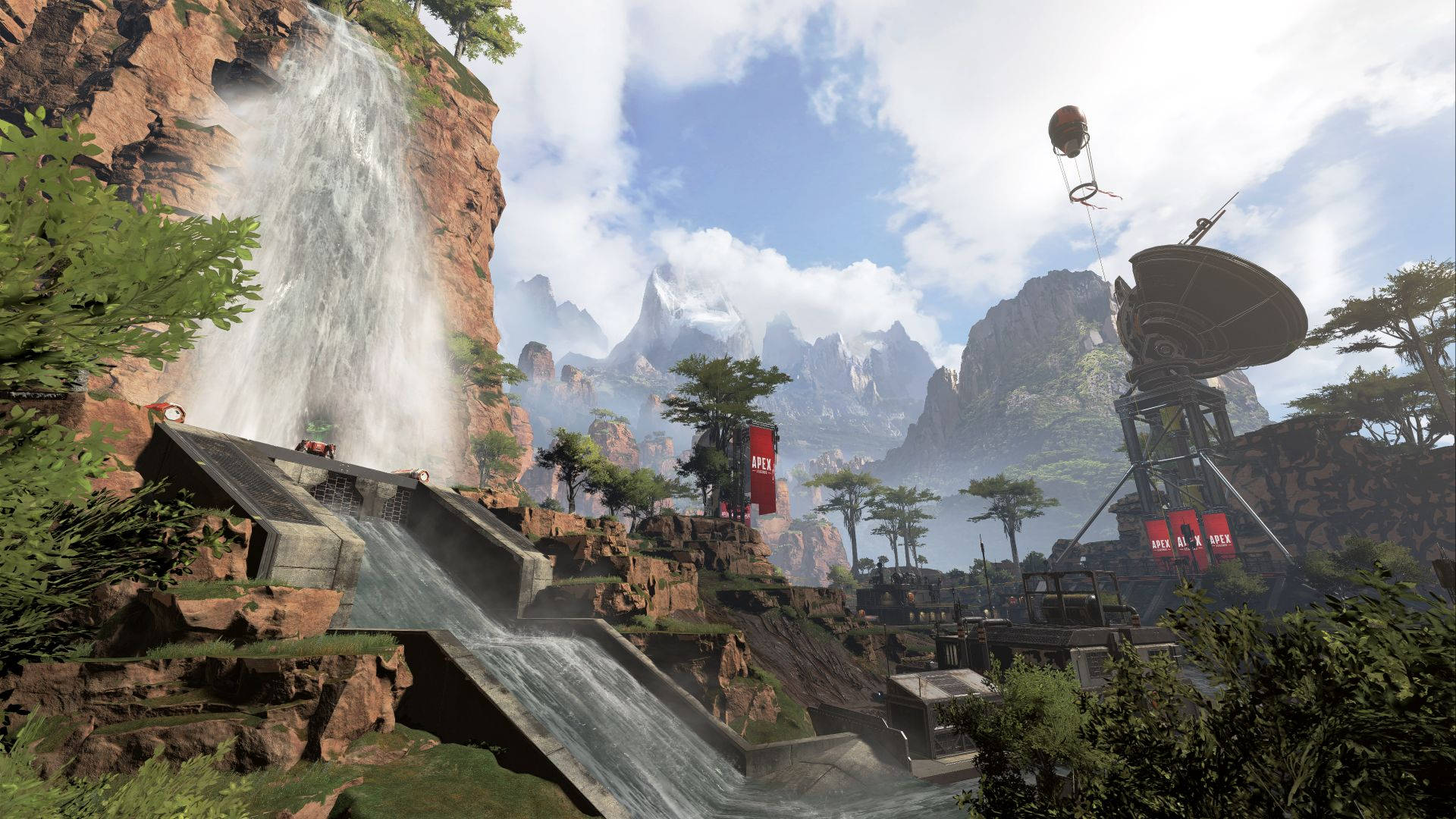 Apex Legends 4K 水簾戰場 壁紙 — 一個巨大的瀑布從懸崖上傾瀉而下，流入一條混凝土渠道，旁邊是未來主義的衛星天線和紅色橫幅，位於山區景觀中。
