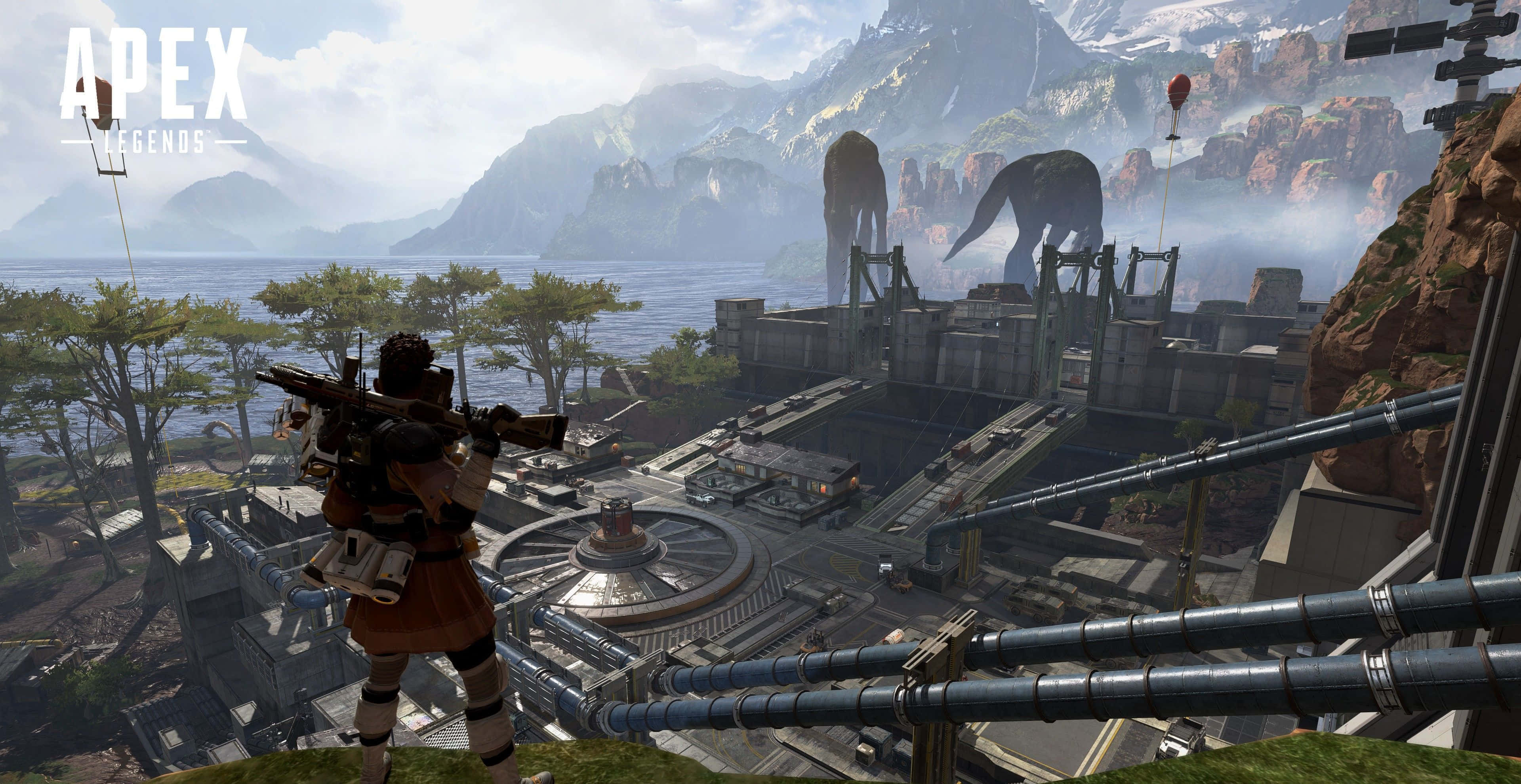 Apex 英雄 桌布 壁紙 — Apex Legends 中的玩家站在懸崖上，俯瞰著一個未來主義的沿海基地，遠處有巨大的恐龍和漂浮的氣球。
