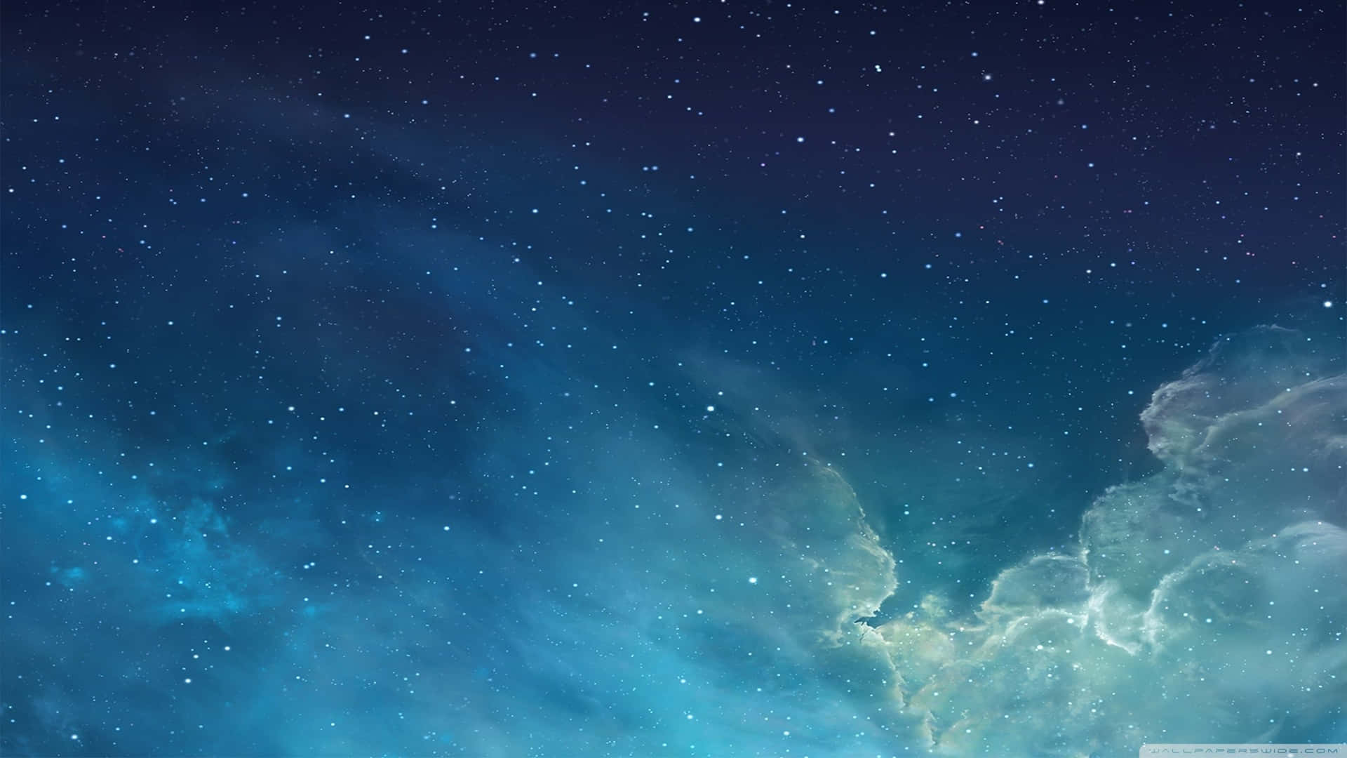星空，有發光的星雲雲團和散落的星星。