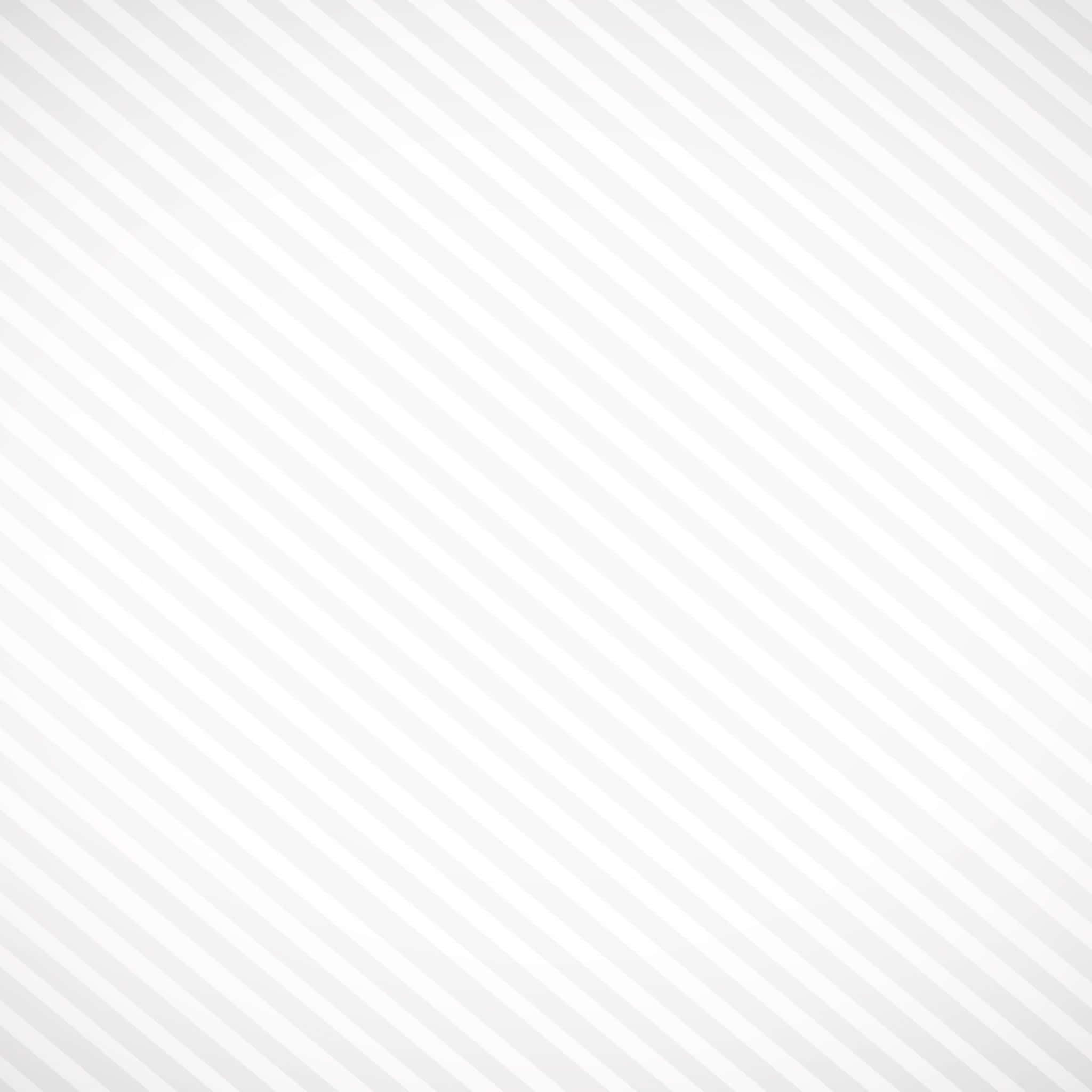 以 Apple iPad 創意與高效並行 壁紙 — 對角灰色和白色條紋營造出乾淨簡約的圖案，具有柔和的對比和幾何節奏。