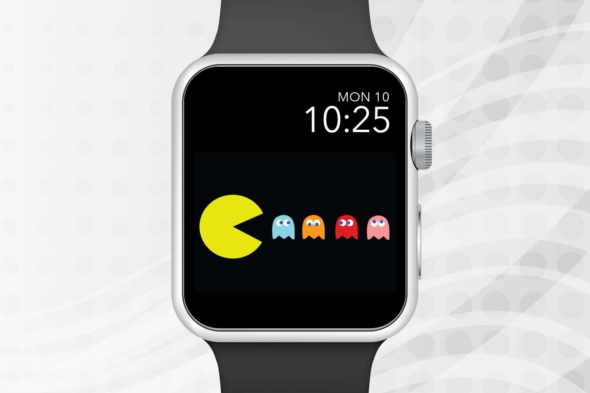 手腕上的 Apple Watch，讓生活更便捷！ 壁紙 — 智能手錶在黑色屏幕上顯示經典的食鬼遊戲，有黃色食鬼和四個彩色鬼魂。