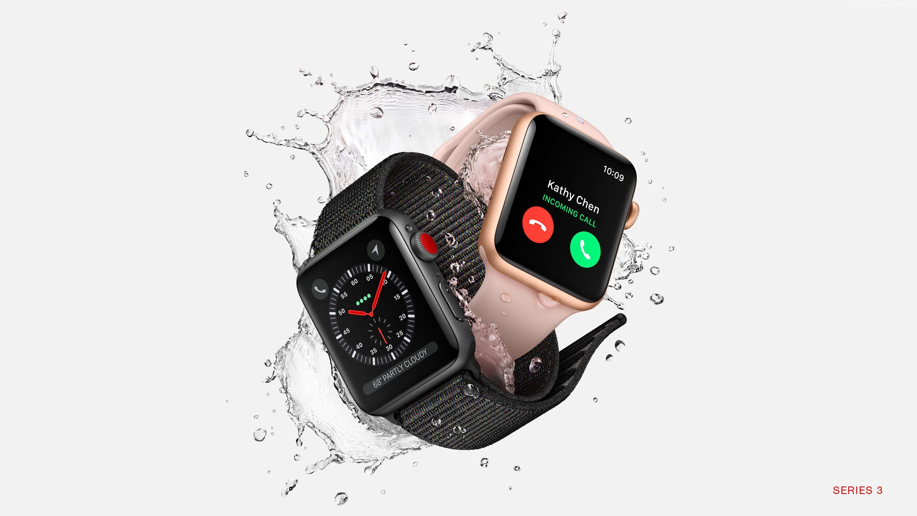 Apple Watch 水花飛濺 壁紙 — 兩款Apple Watch Series 3型號，配備黑色和玫瑰金色錶帶，在純白色背景上衝破水花。