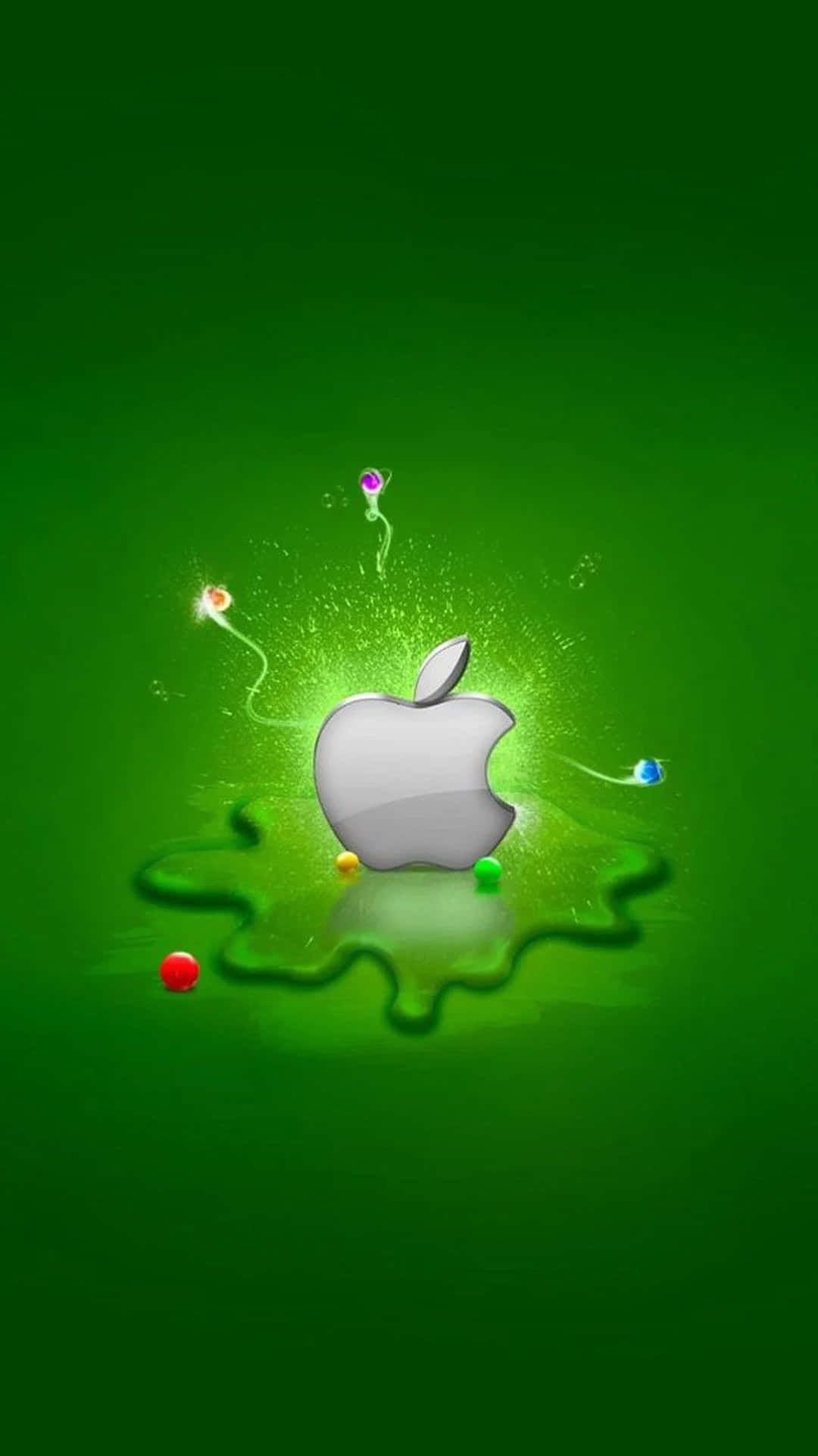 發光的Apple標誌在綠色背景上帶有彩色火花