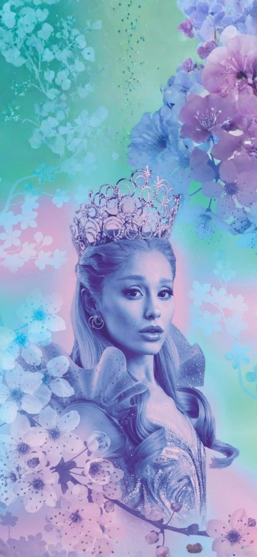  壁紙 — Ariana Grande 戴著閃爍的皇冠，被粉彩櫻花環繞，背景是夢幻的漸變天空。