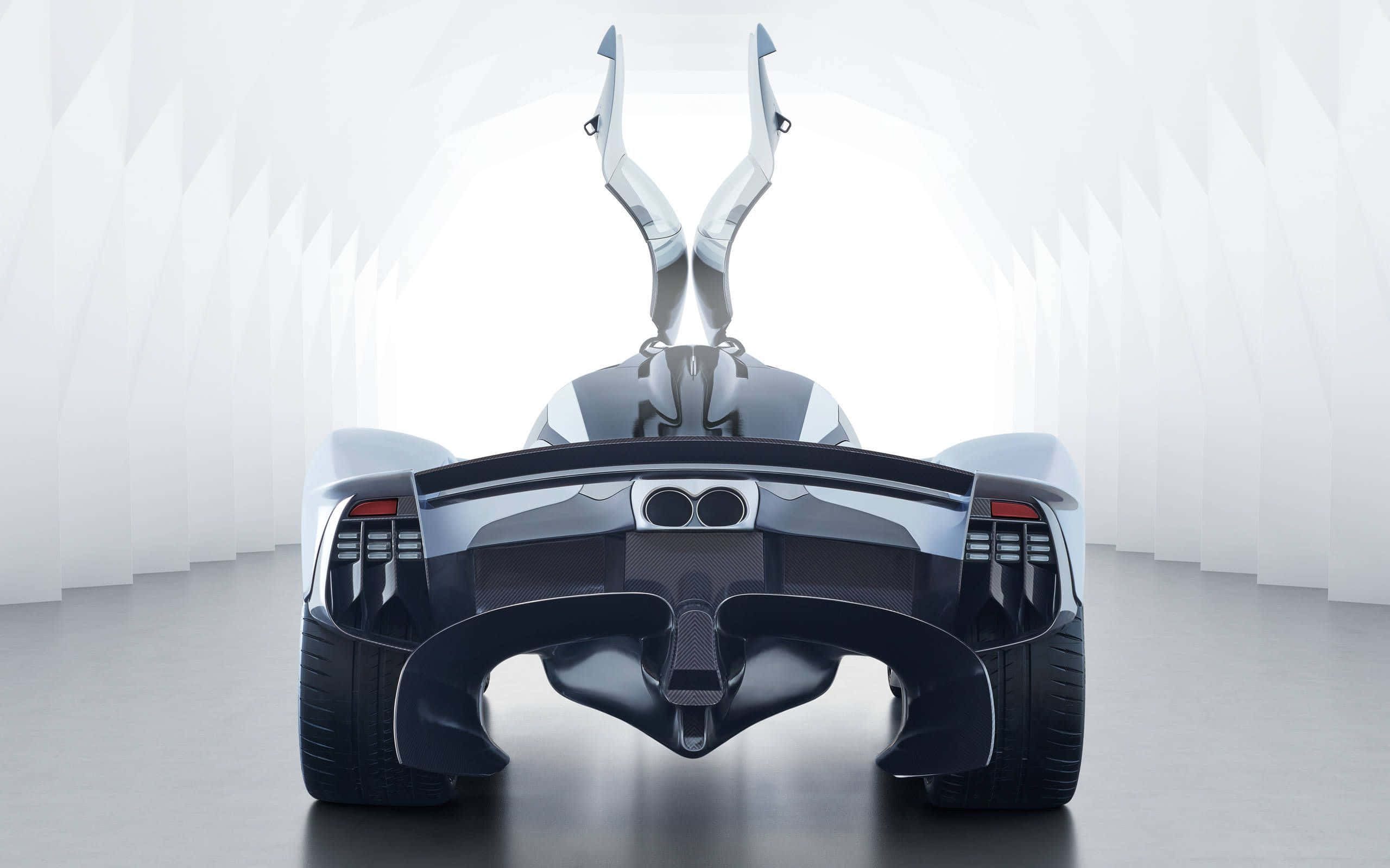 Aston Martin Valkyrie - 汽車工程嘅巔峰之作 壁紙 — 一架時尚的未來感跑車，鷗翼門打開，停在簡約的白色隧道中。