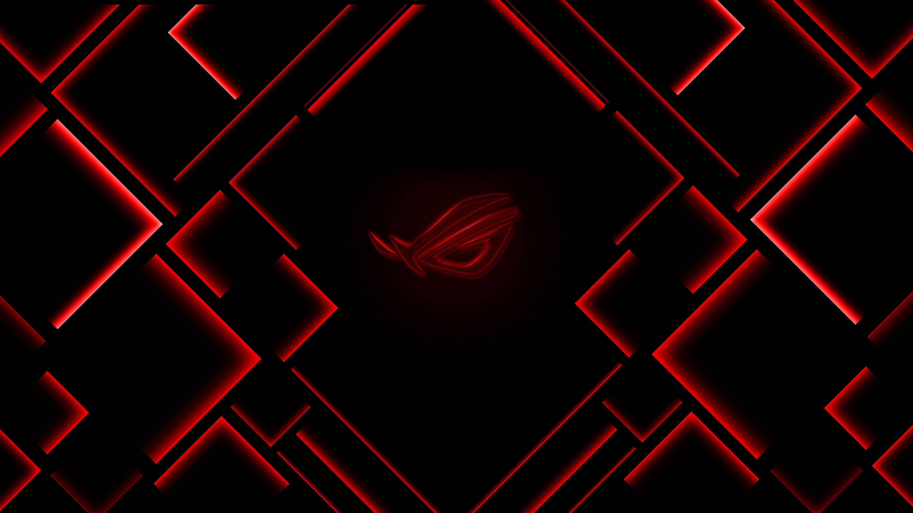 ASUS ROG 4K 遊戲標誌嵌於紅色菱形 壁紙 — 鮮豔的紅色霓虹幾何線條在黑色背景上圍繞中央的 ROG 標誌形成發光的網格。
