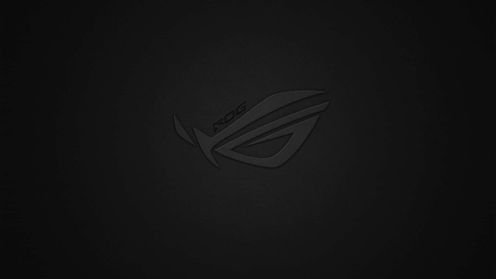 ASUS ROG Zephyrus GX501 — 超薄遊戲筆電 壁紙 — 一個極簡黑色ROG標誌，微妙地壓印在紋理深色背景上。