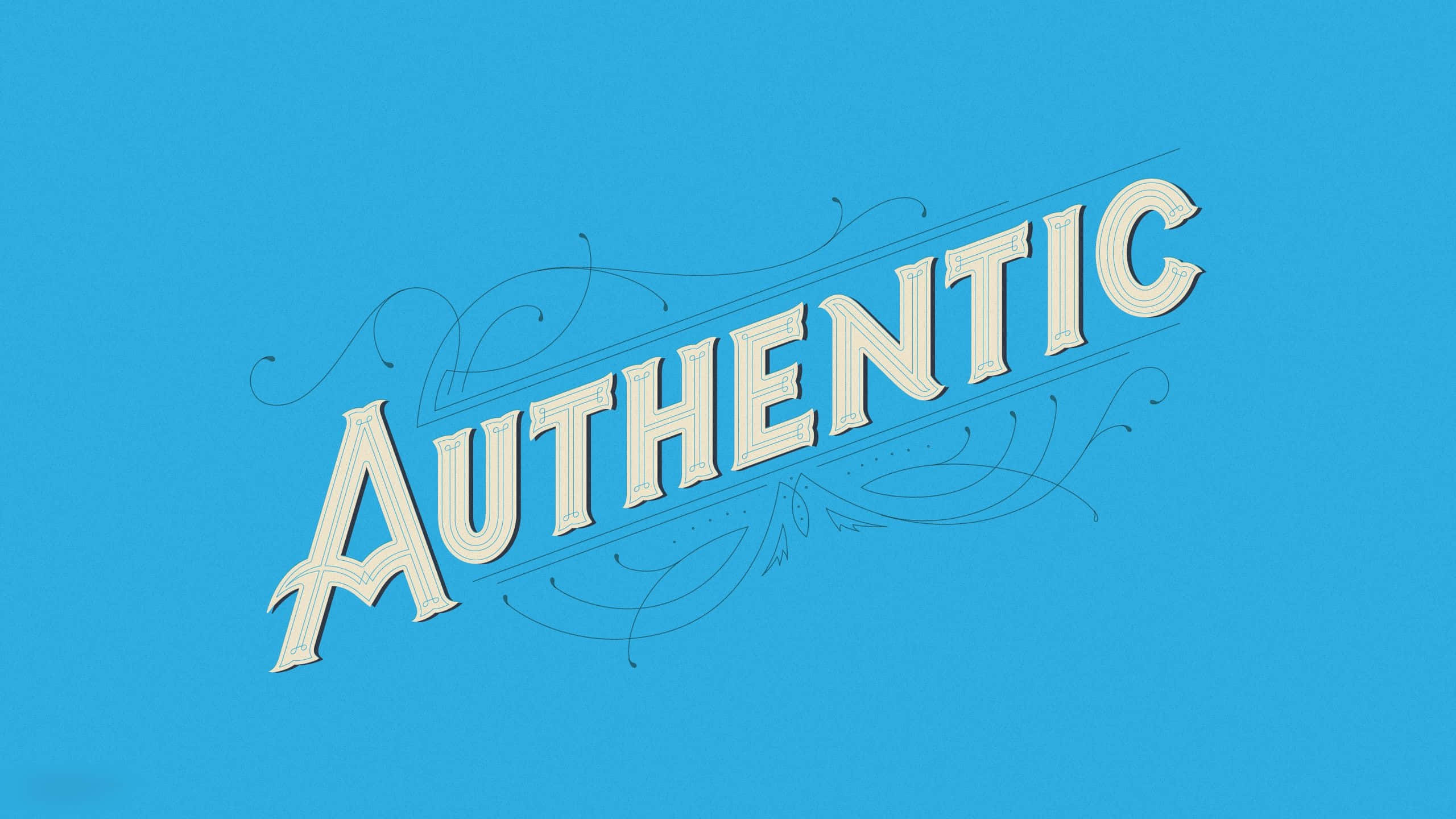 Authentic 桌布 壁紙 — 「authentic」一詞以優雅的奶油色復古字體呈現，帶有旋轉的花飾，襯以純藍色背景。