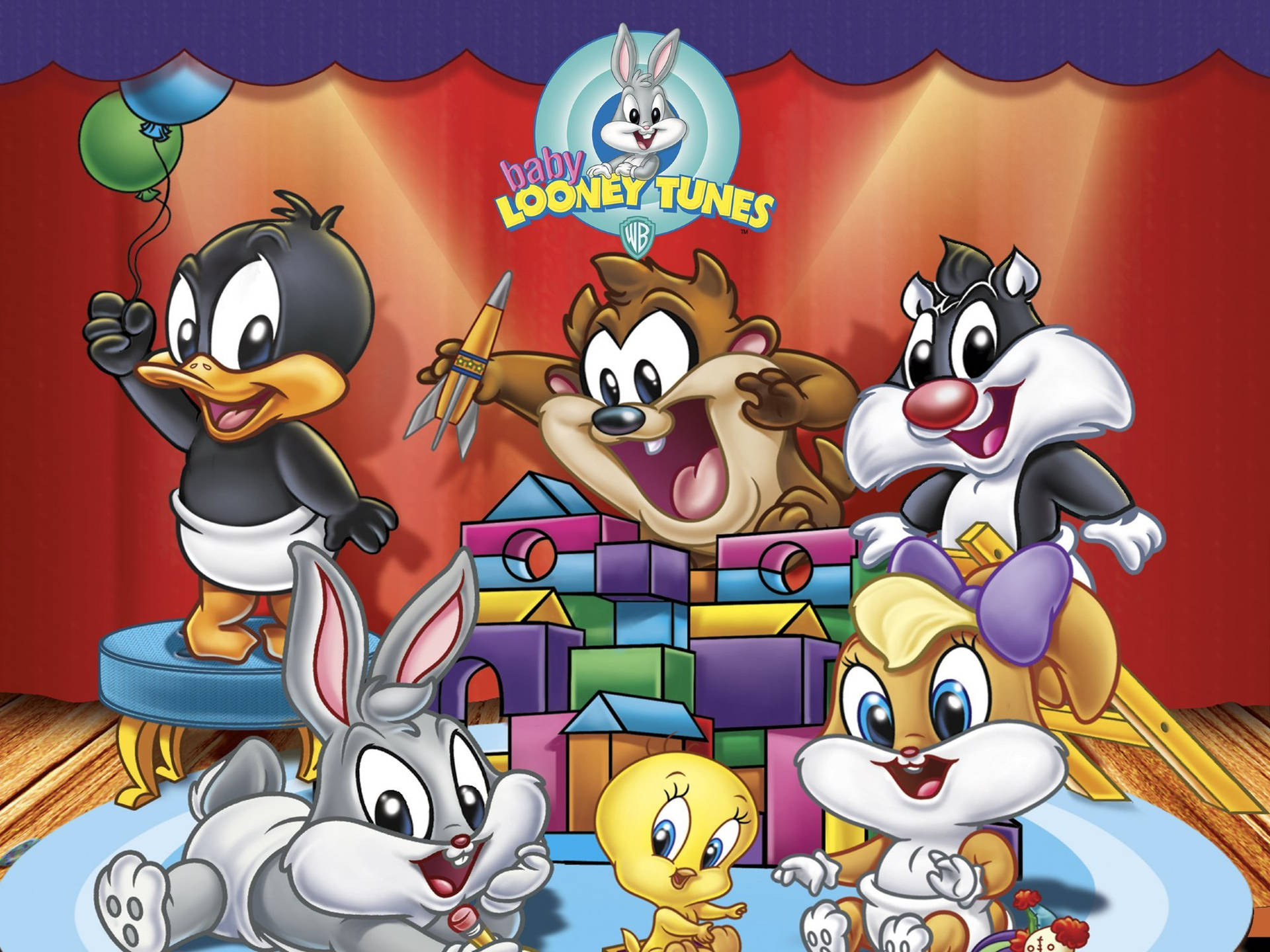 Baby Looney Tunes 角色在有氣球的舞台上玩玩具。