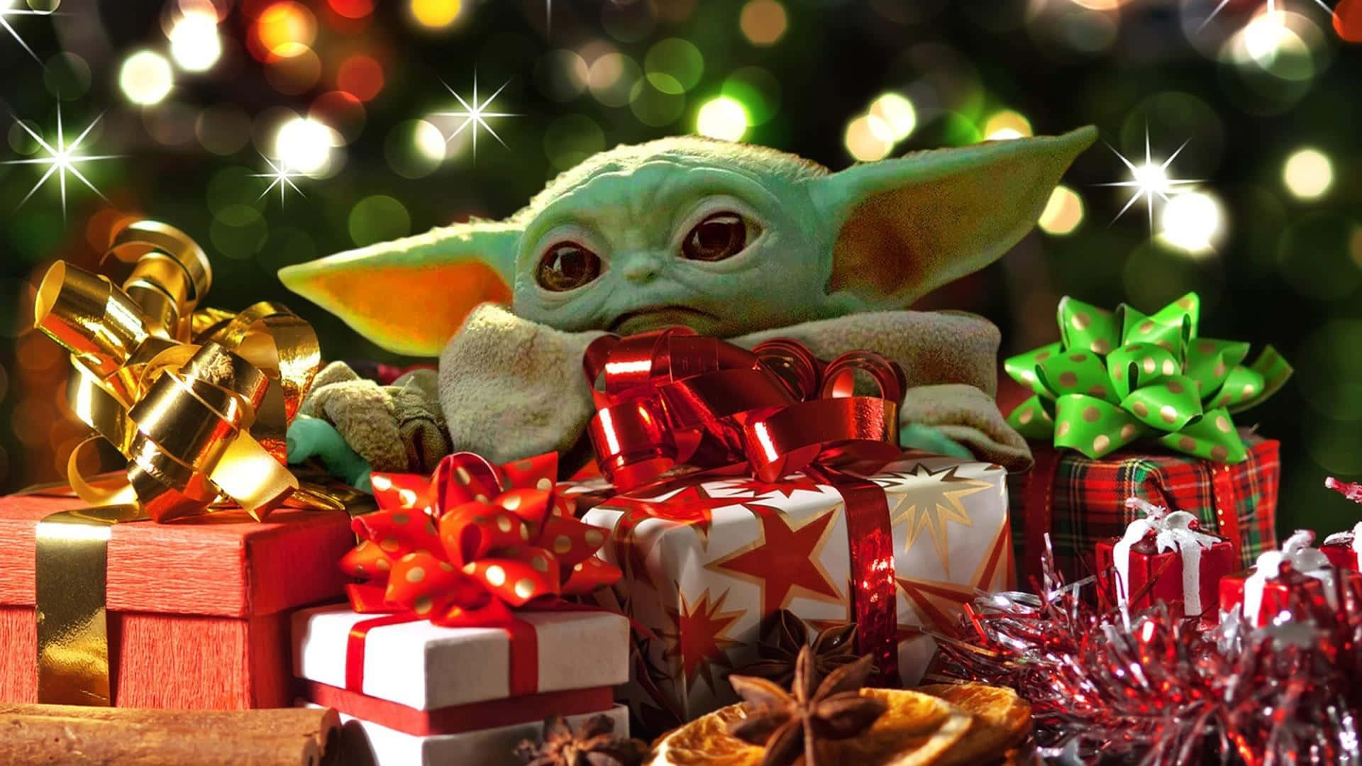 Baby Yoda聖誕禮物 壁紙 — Baby Yoda 坐在色彩繽紛的聖誕禮物中，背景有閃爍的散景燈光。
