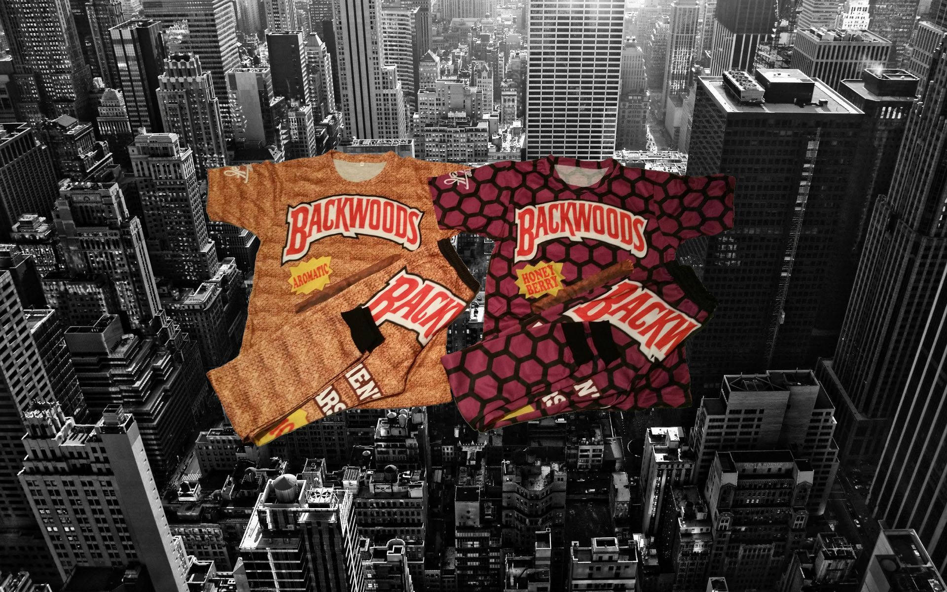 兩件Backwoods品牌T恤漂浮在單色城市天際線上。