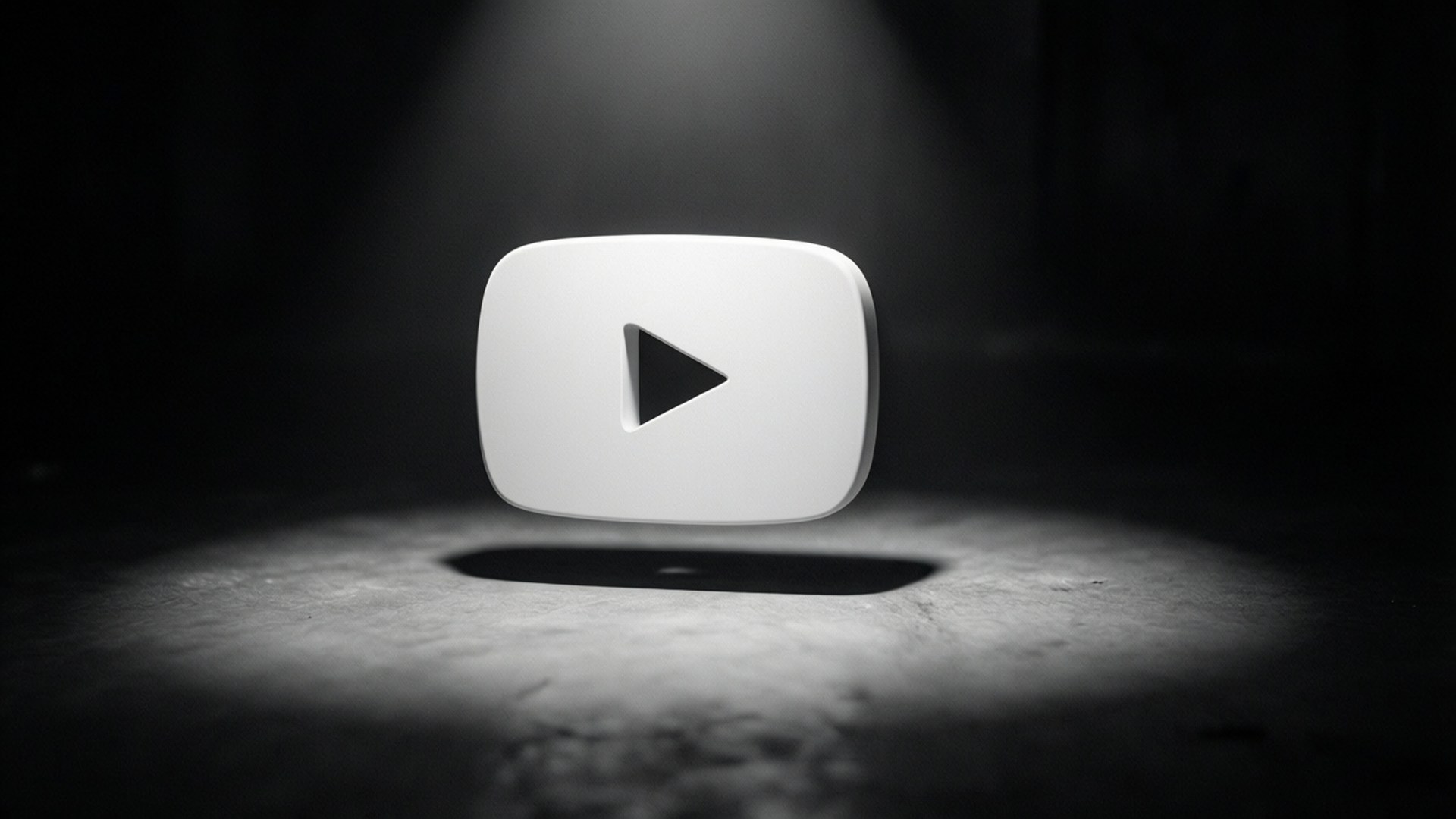 桌布 壁紙 — 一個白色YouTube播放按鈕圖標，在黑暗紋理地板上被聚光燈照亮。