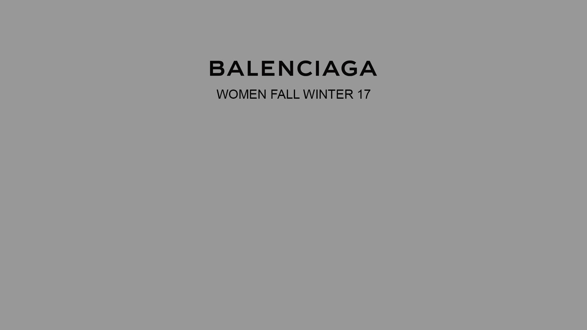Balenciaga 女裝秋冬 17 壁紙 — 極簡灰色背景，粗體黑色文字宣佈 Balenciaga Women Fall Winter 17 系列。