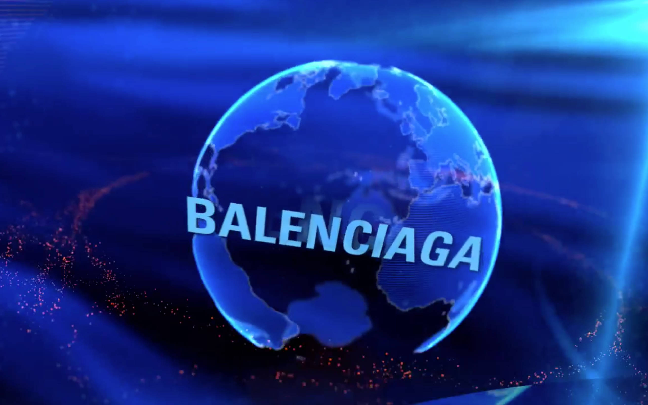 Balenciaga 藍色地球圖案 壁紙 — 一個發光的藍色地球儀，上面有 Balenciaga 字樣漂浮在中心，背景是動態的數位藍色背景，帶有紅色粒子軌跡。