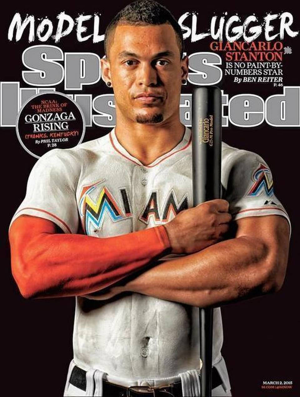 棒球運動員Giancarlo Stanton穿著邁阿密馬林魚球衣，在《體育畫報》封面上手持球棒。