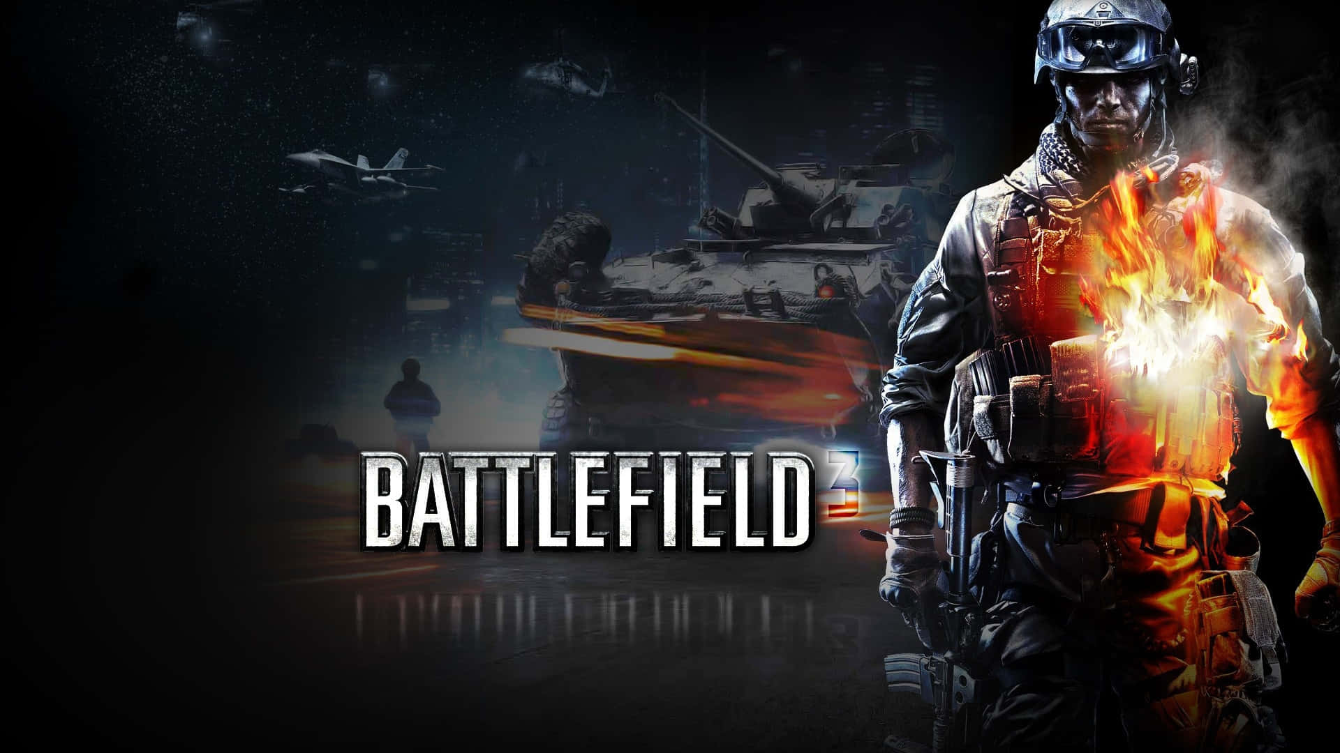 《Battlefield 3》壯觀戰鬥 壁紙 — 一名被火焰吞噬的士兵在黑暗的戰場上挑釁地站立，背景有坦克和噴射機。