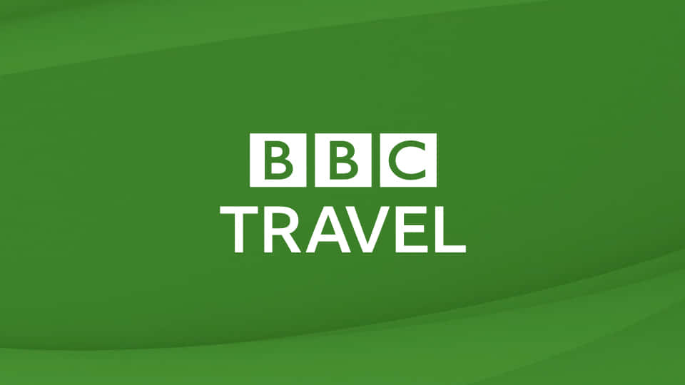綠色漸變背景上的 BBC Travel 標誌
