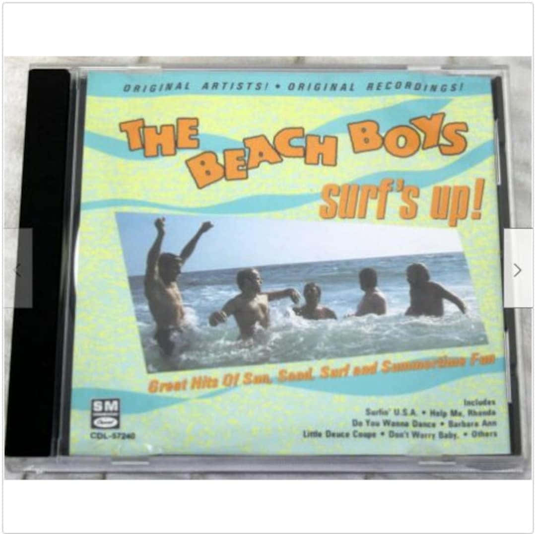 復古 Beach Boys Surf's Up 專輯封面，男人在海浪中。
