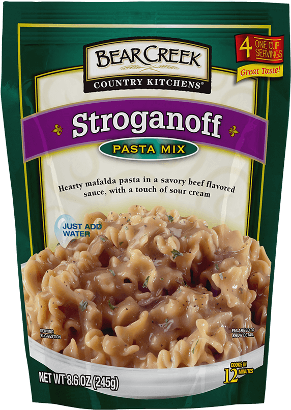 Bear Creek 醬汁意麵混合包裝 壁紙 — Bear Creek Country Kitchens Stroganoff 意粉混合包裝，鮮綠色包裝，特寫鏡頭展示奶油馬法爾達意粉配牛肉醬。