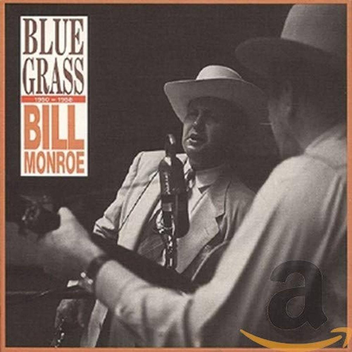 古董藍草音樂 Bill Monroe 專輯封面 壁紙 — 一張黑白照片，比爾·門羅戴著帽子和西裝對著復古麥克風唱歌。