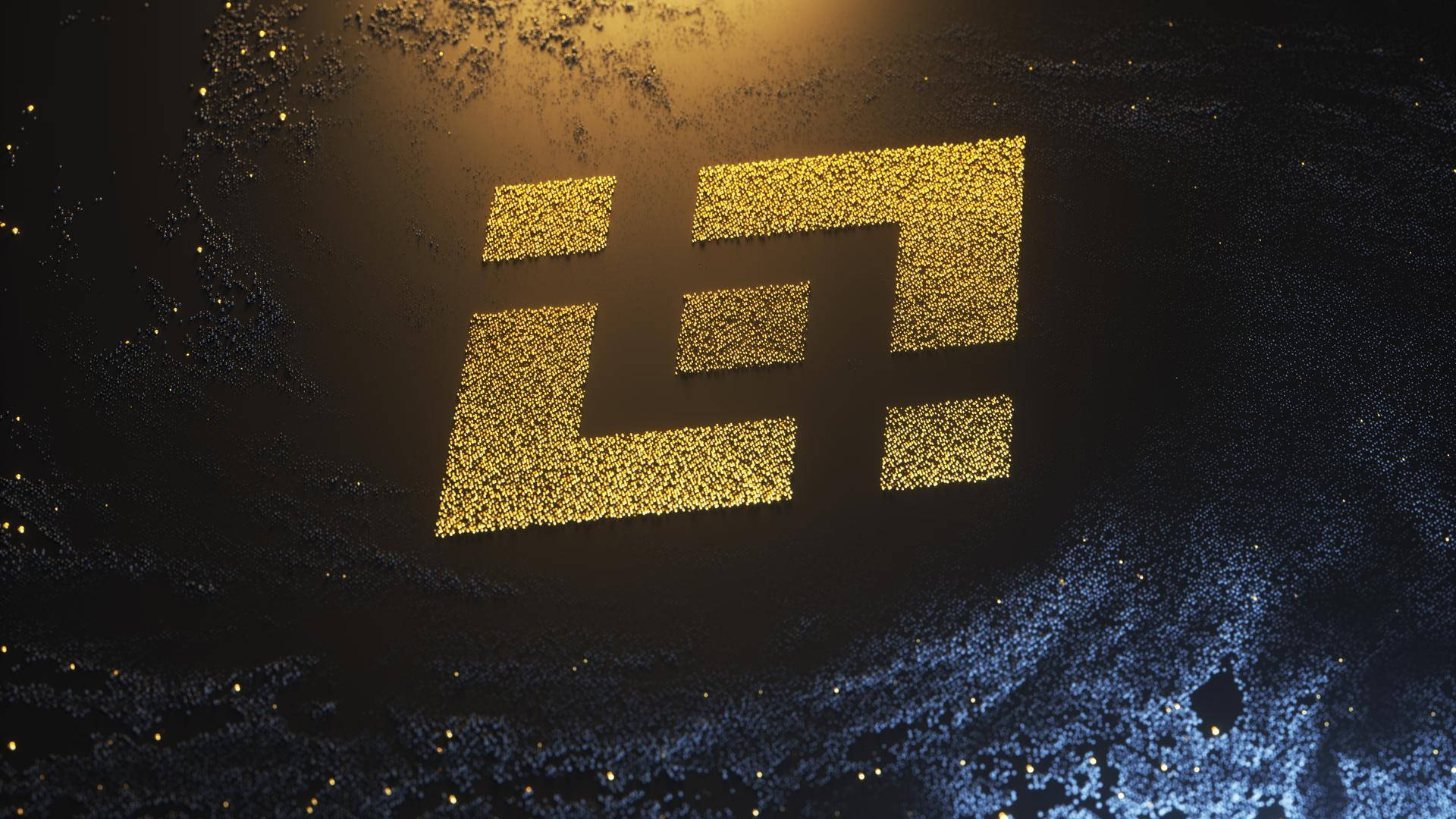 Binance 宇宙標誌 壁紙 — 一個由發光粒子形成的金色抽象符號，在帶有藍色和黃色星雲的黑暗宇宙背景中漂浮。