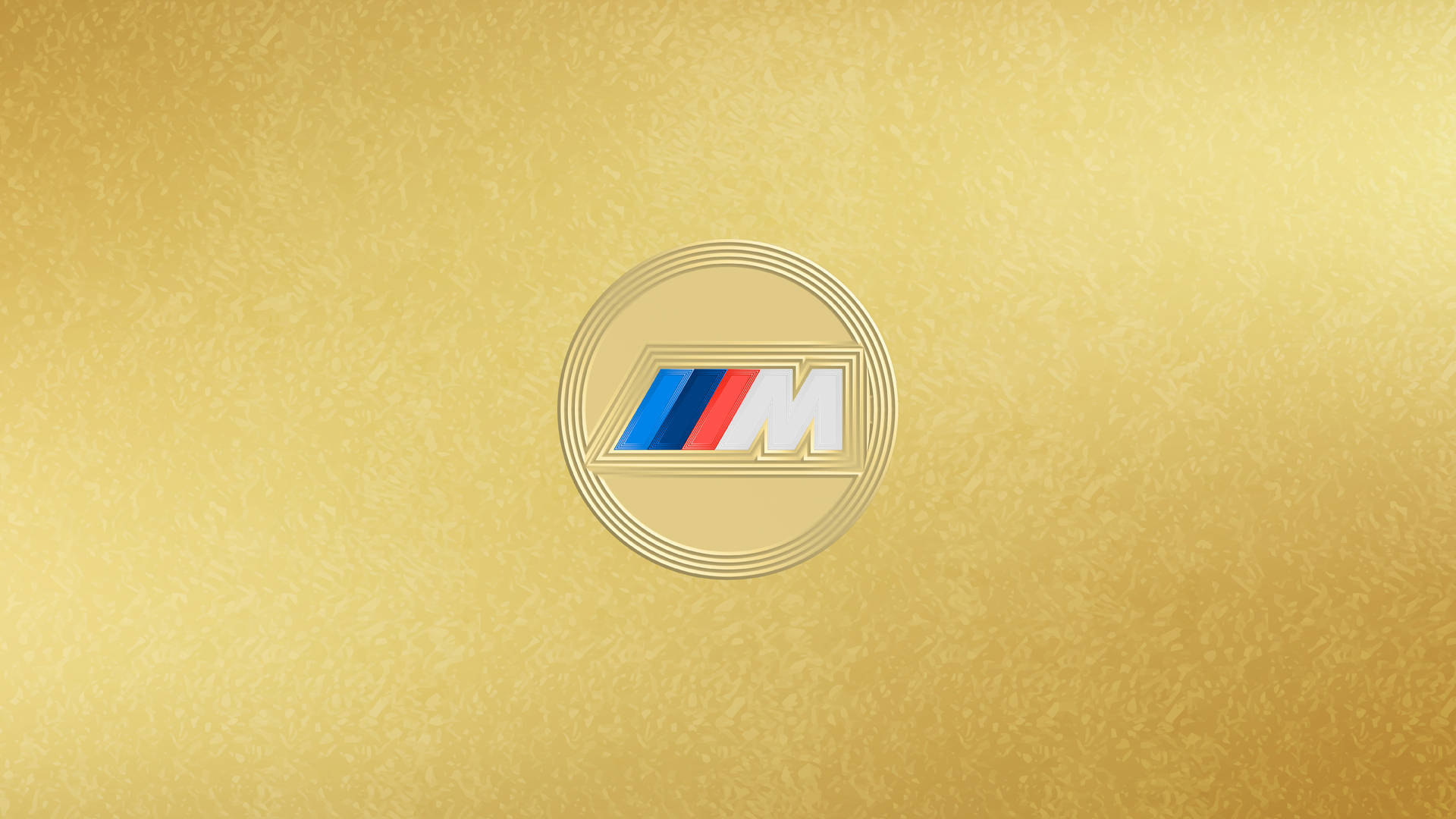 帶有紋理的金色背景上的 BMW M 標誌