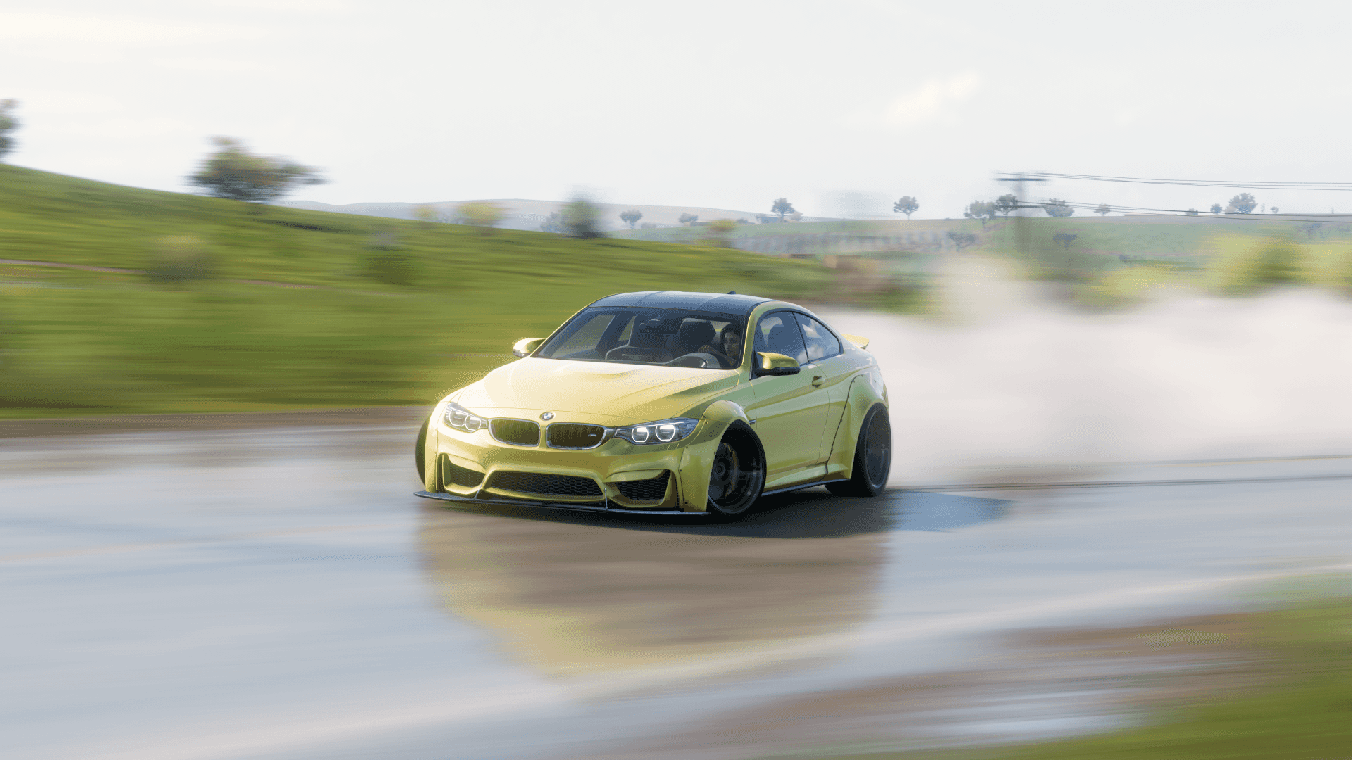 BMW 壁紙 — 一輛青檸綠色的BMW M3在潮濕的道路上橫向飄移，揚起白煙，背景是模糊的綠色山坡。
