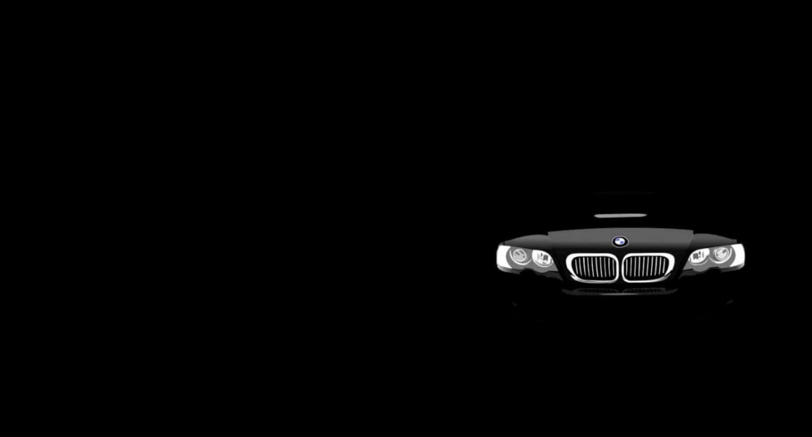黑色BMW汽車在黑暗背景中亮著車頭燈。