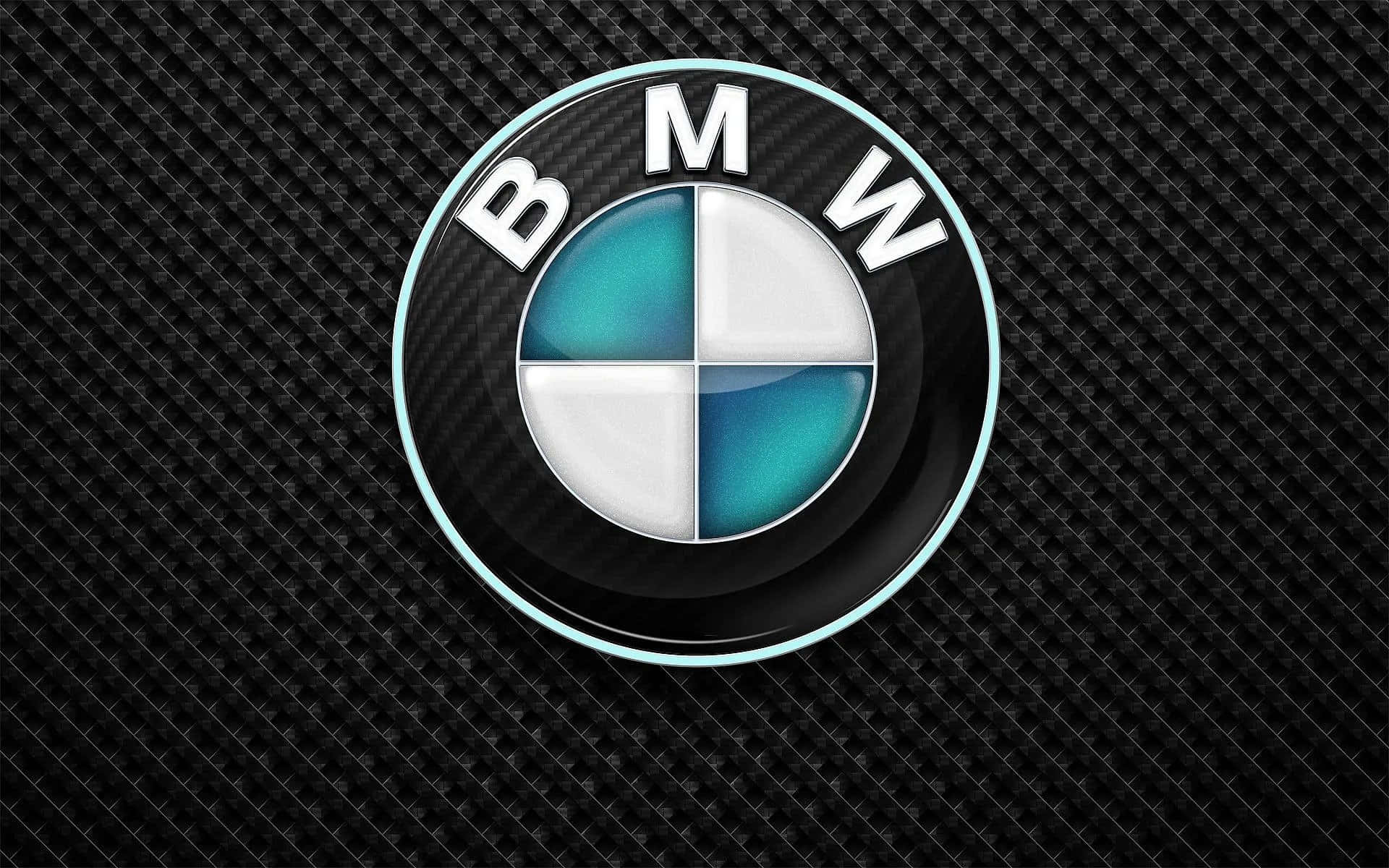 BMW標誌 壁紙 — BMW 標誌帶有藍色和白色象限，在紋理黑色碳纖維背景上閃耀。