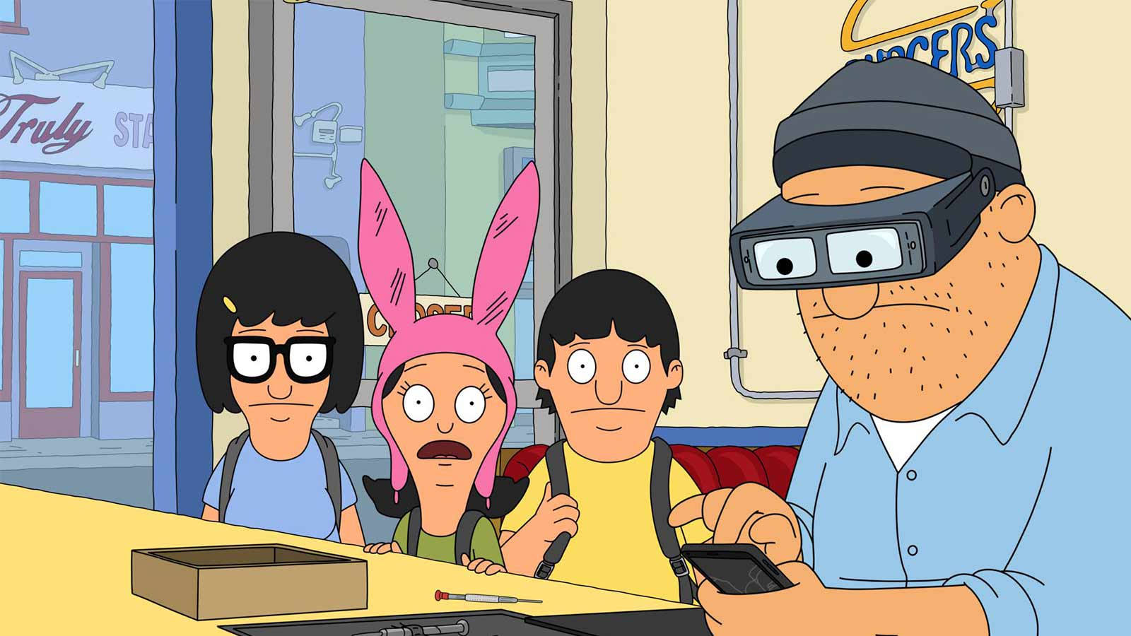 Bob's Burgers 一家在餐廳，Gene 戴著 VR 眼鏡拿著手機。