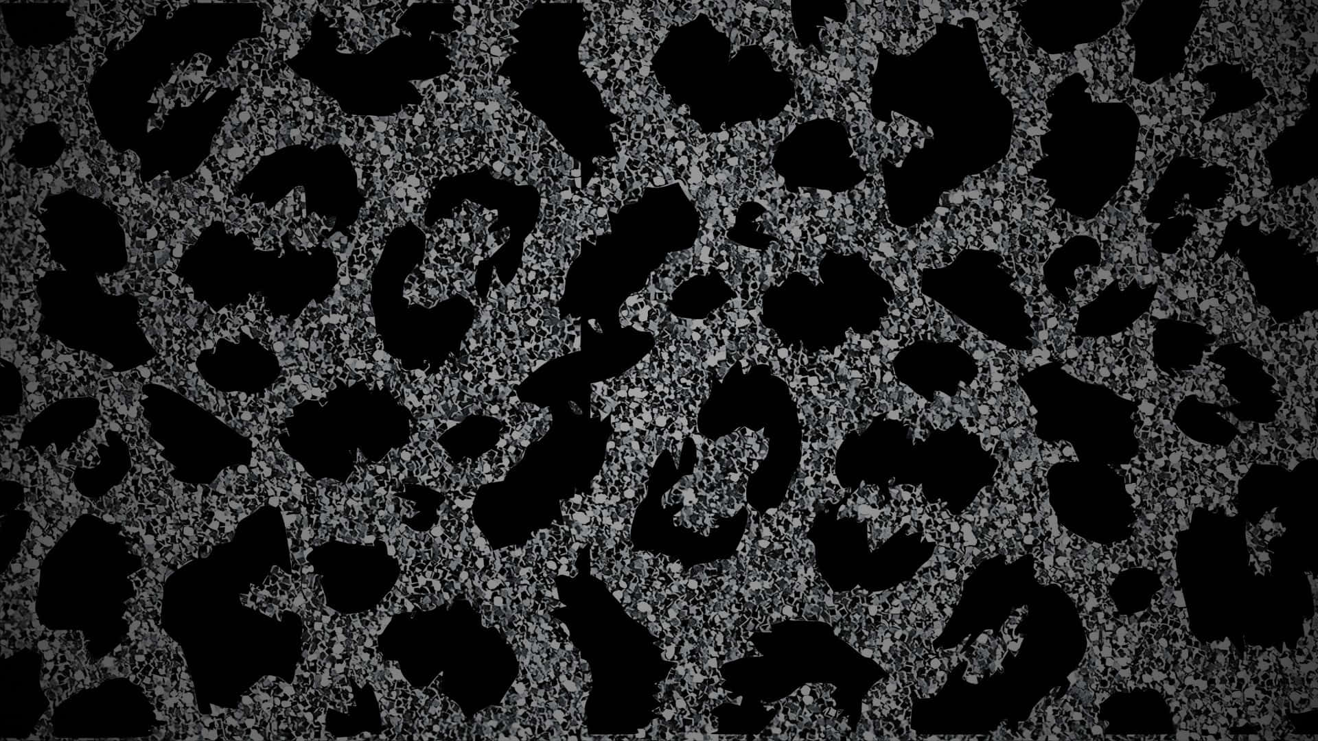  壁紙 — 大膽的黑灰色豹紋圖案，帶有紋理顆粒背景。