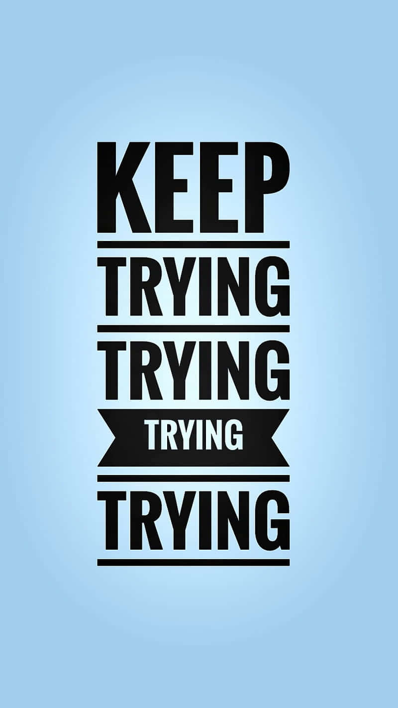  壁紙 — 粗體黑色勵志文字「KEEP TRYING」垂直堆疊在柔和的漸變藍色背景上。