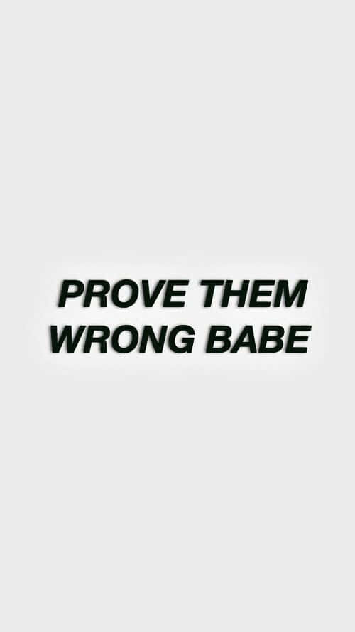  壁紙 — 粗體黑色文字顯示 prove them wrong babe，居中於純淺灰色背景上。