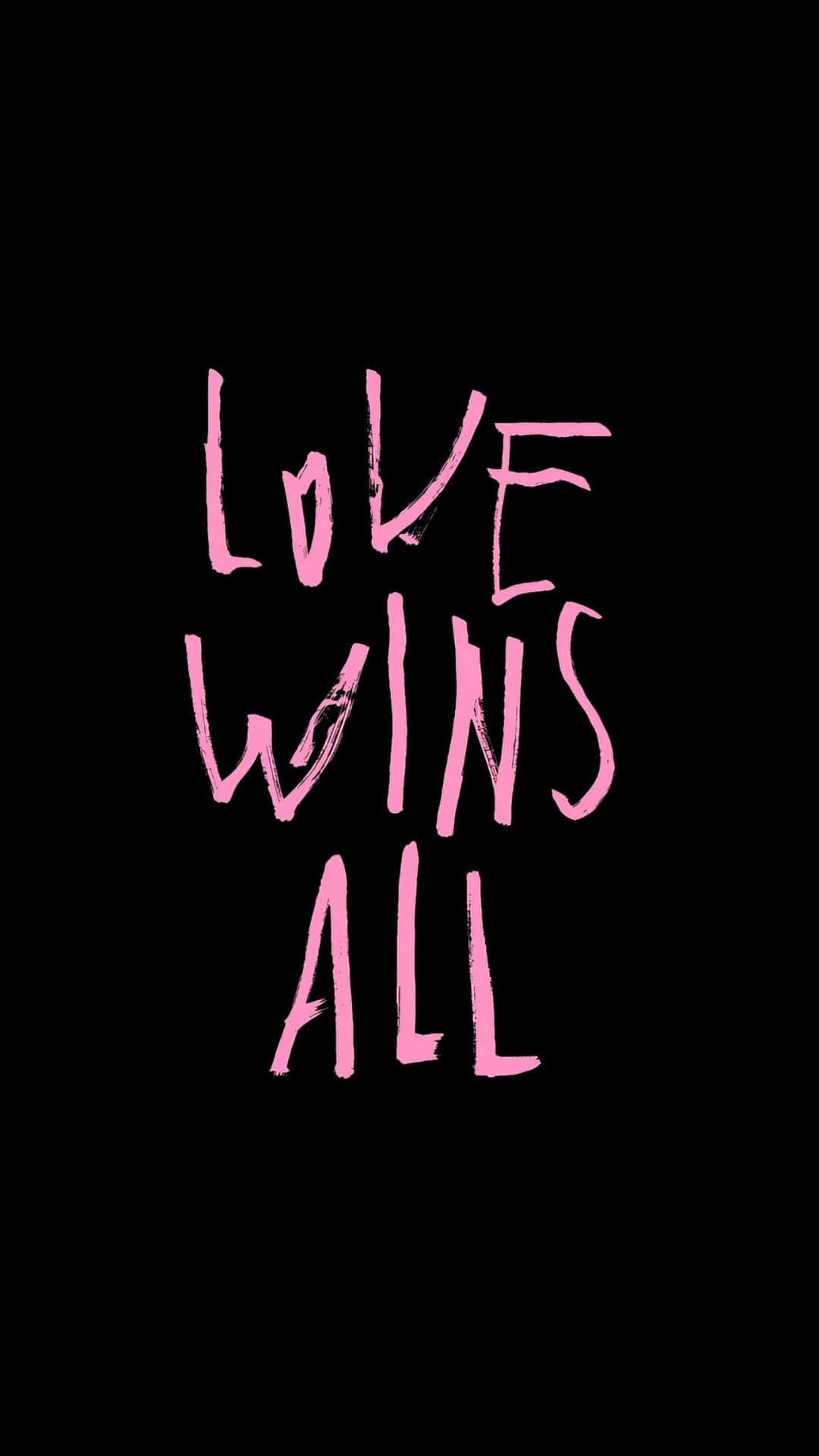  壁紙 — 大膽的粉紅色筆觸文字在純黑色背景上寫著「LOVE WINS ALL」。