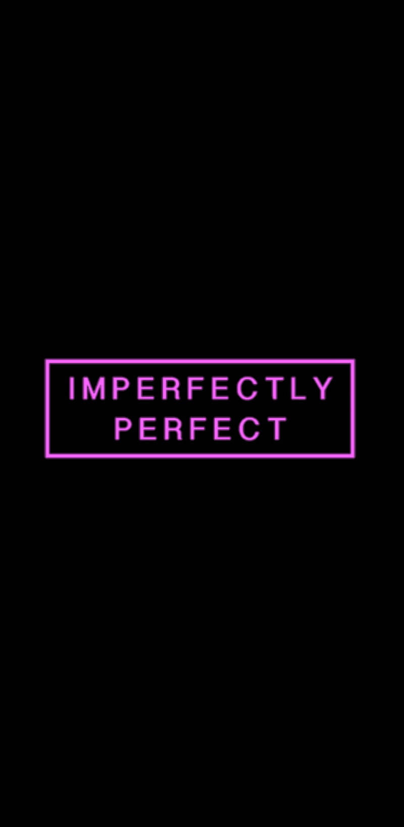 粉紅色霓虹燈文字顯示「imperfectly perfect」，在黑色背景上的矩形內。