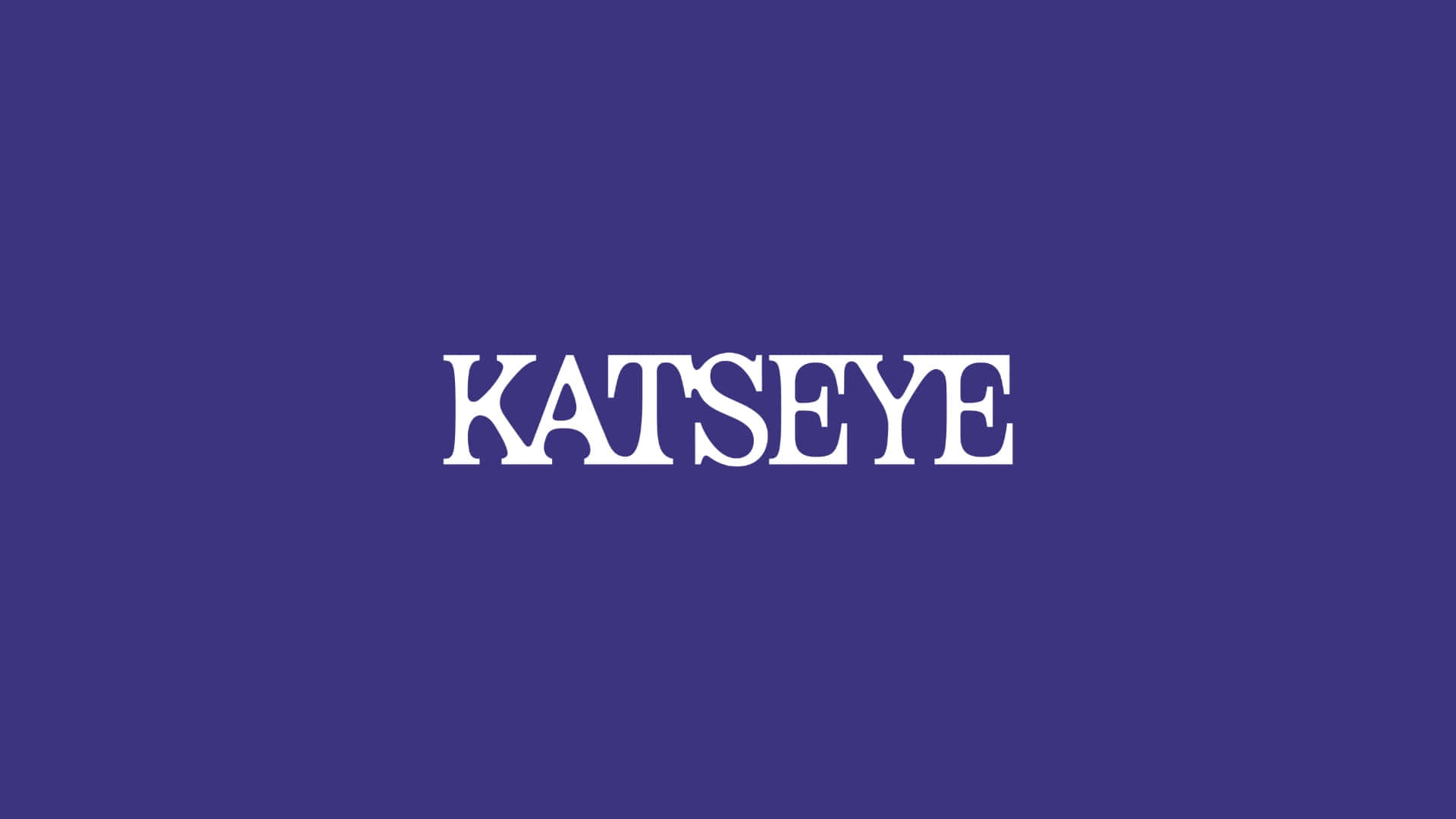  壁紙 — 粗體白色「KATSEYE」文字居中於純深紫色背景上。