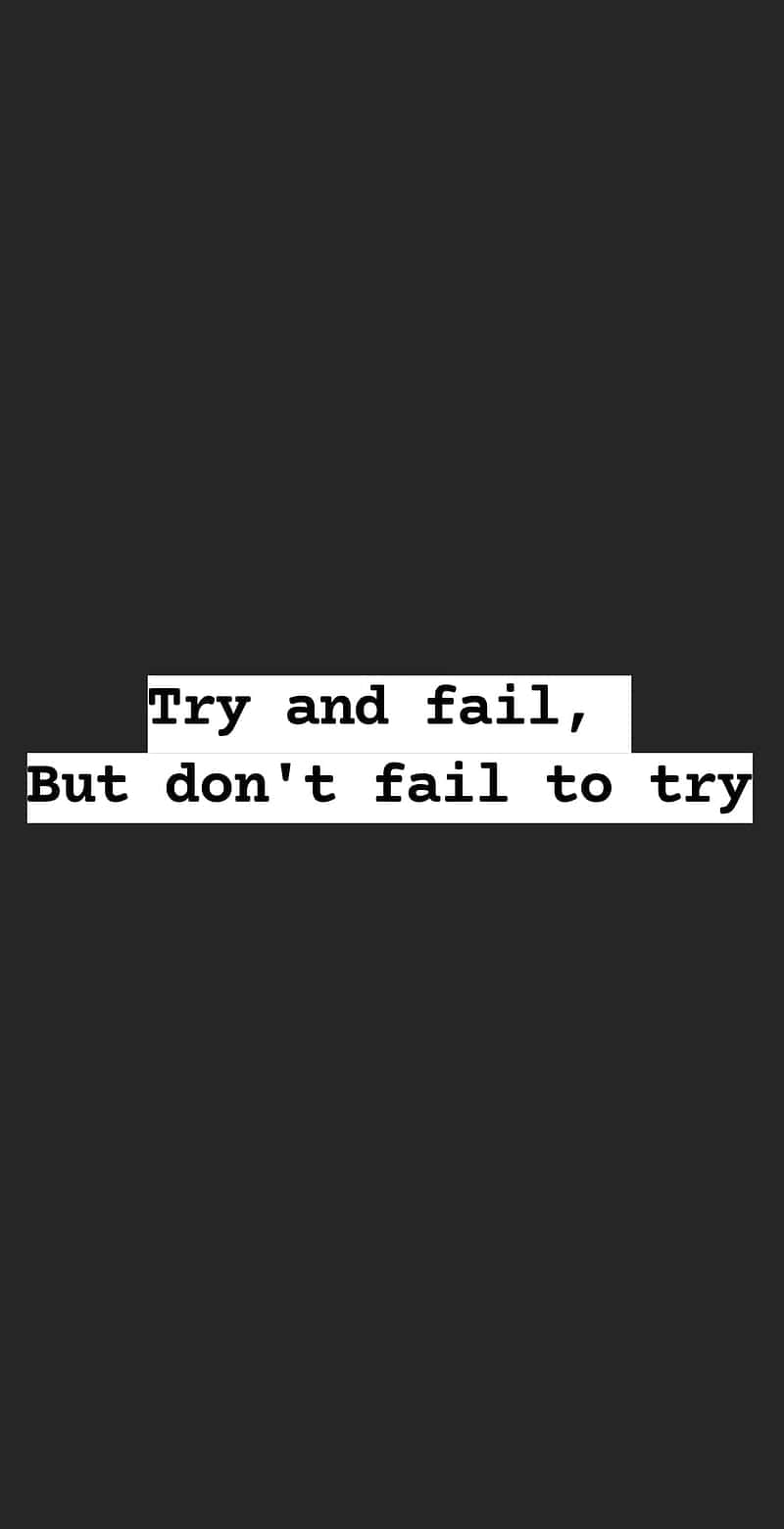  壁紙 — 黑色背景上以粗體白色文字顯示「Try and fail, But don't fail to try」，採用簡約設計。