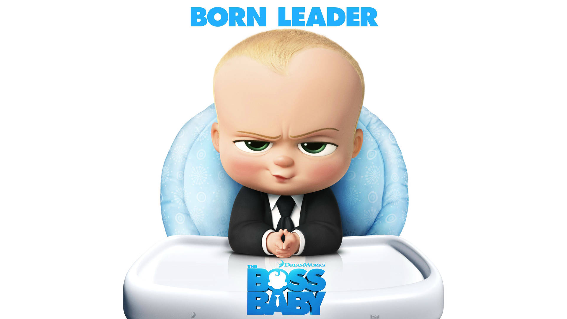 卡通嬰兒穿西裝坐在高腳椅，有'BORN LEADER'文字。