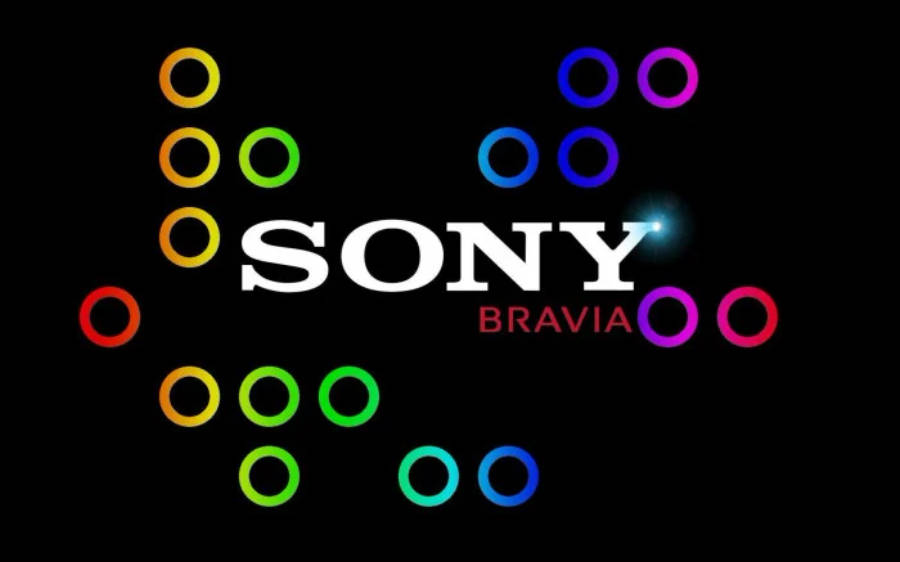 索尼Bravia標誌彩虹圓圈 壁紙 — Sony Bravia 標誌被彩色發光圓圈包圍在黑色背景上。