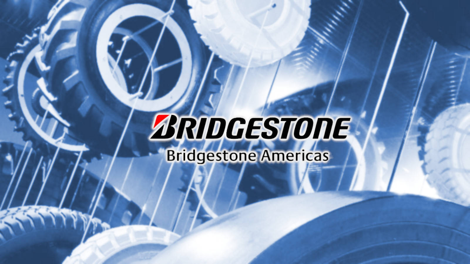 Bridgestone Americas 標誌被輪胎設計和發光效果包圍。
