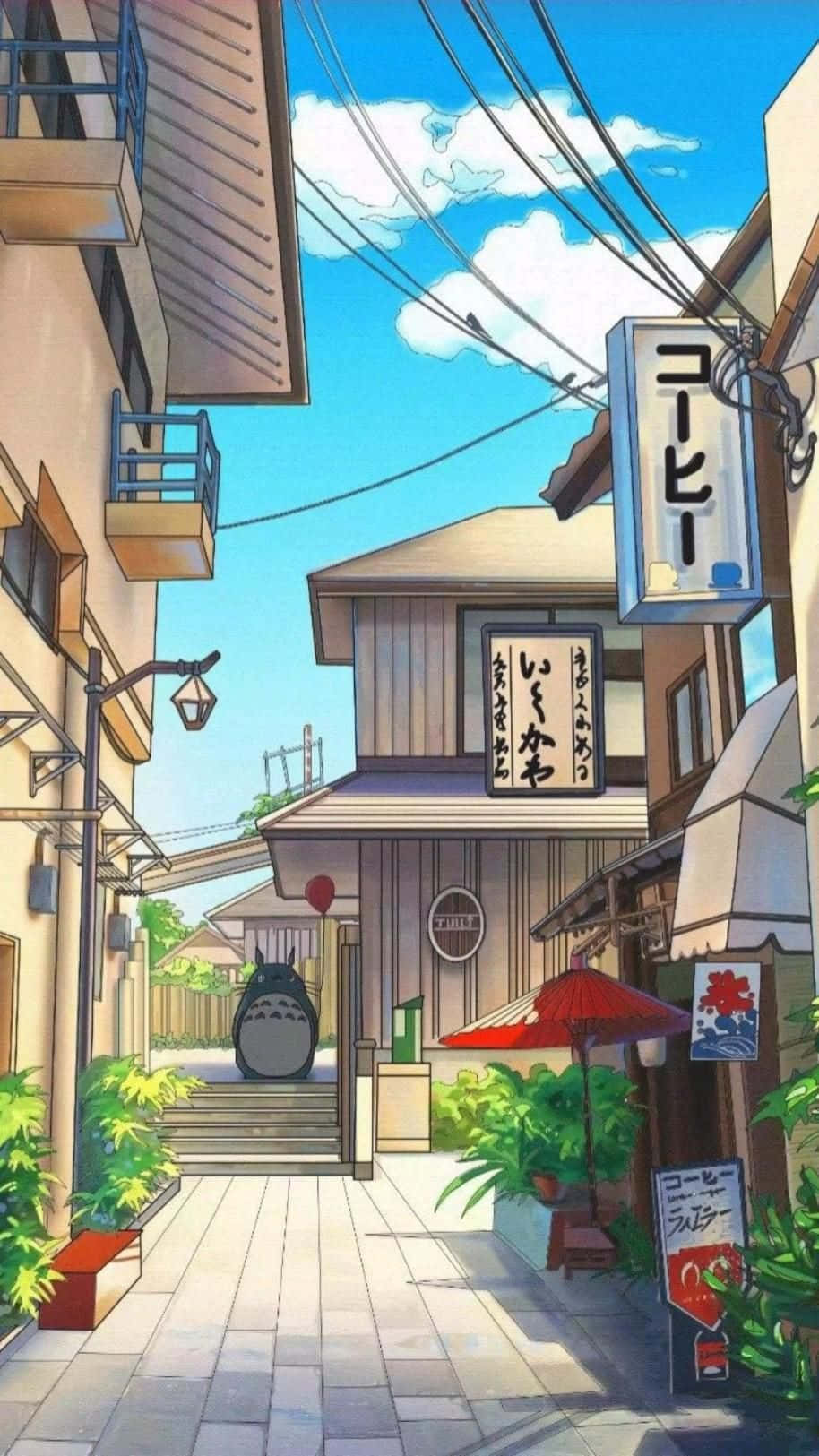  壁紙 — 日本一條明亮的動漫風格小巷，咖啡店入口處有龍貓雕像，藍天白雲。