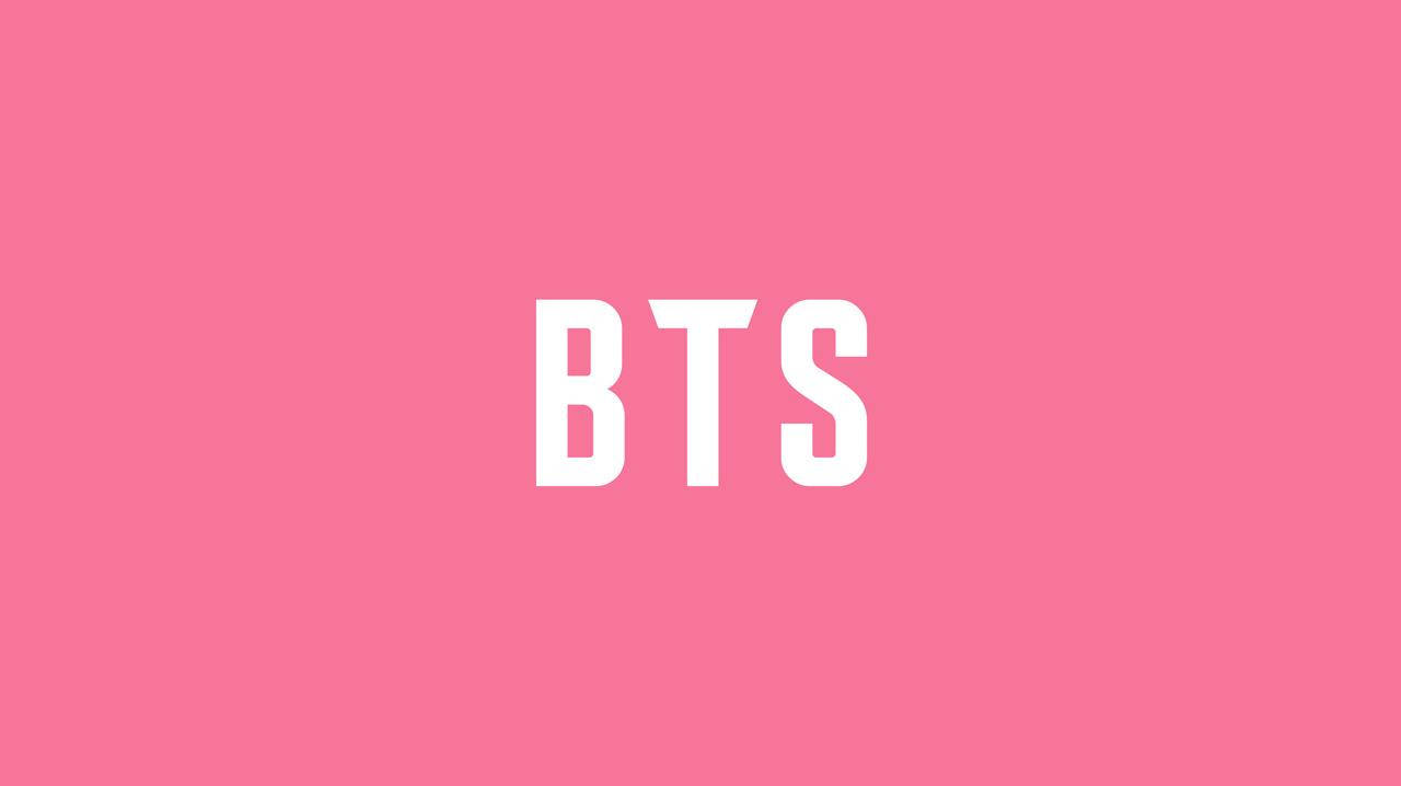 粉色背景上居中放置白色BTS文字。