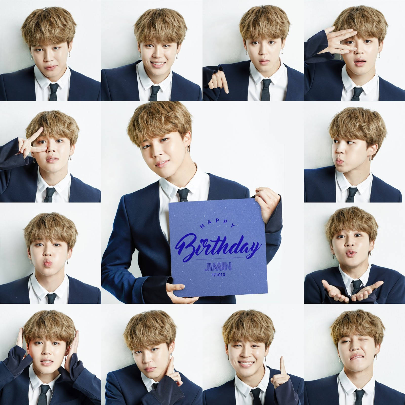 穿西裝的年輕男子拿著生日卡做出鬼臉姿勢