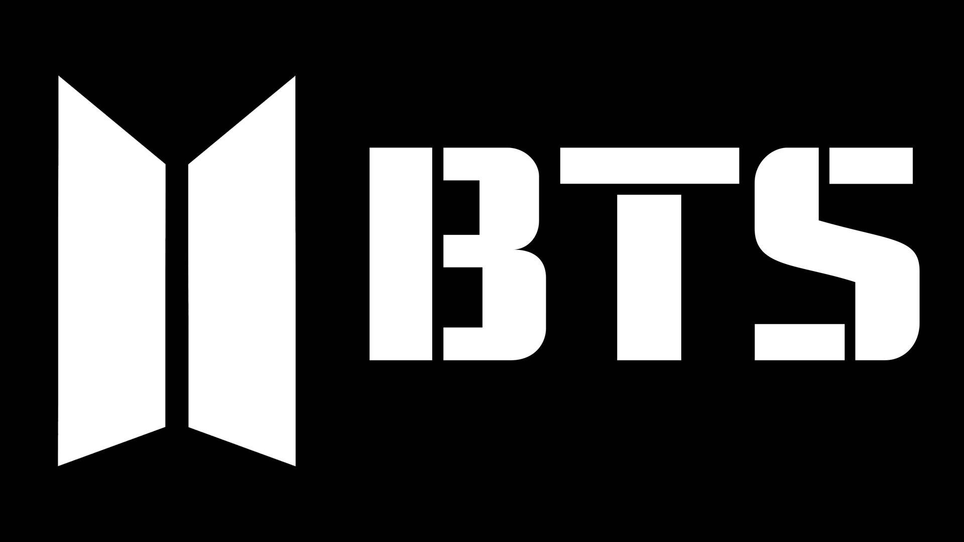 黑色背景上帶有翅膀的BTS標誌 — BTS標誌 壁紙