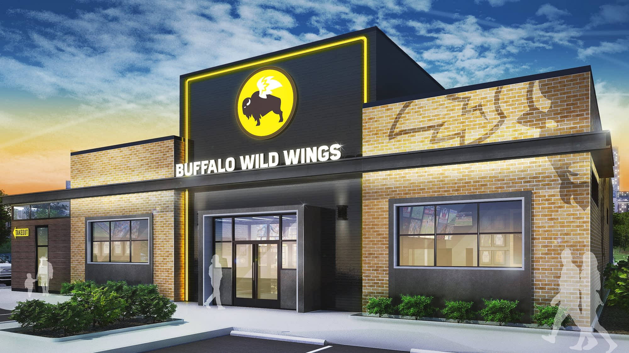 Buffalo Wild Wings 餐廳建築設計 壁紙 — 一間現代化的Buffalo Wild Wings餐廳在黃昏時分，帶有發光的霓虹招牌和走向入口的剪影人物。