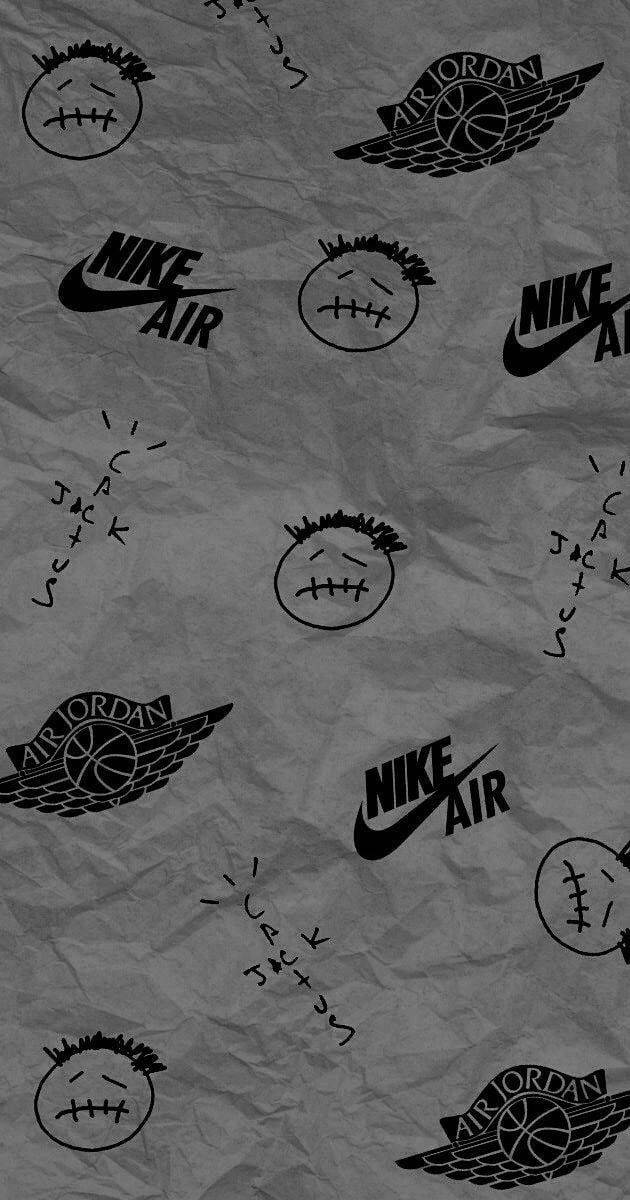皺灰色紙張，帶有黑色Nike Air Jordan標誌和縫合面孔塗鴉。
