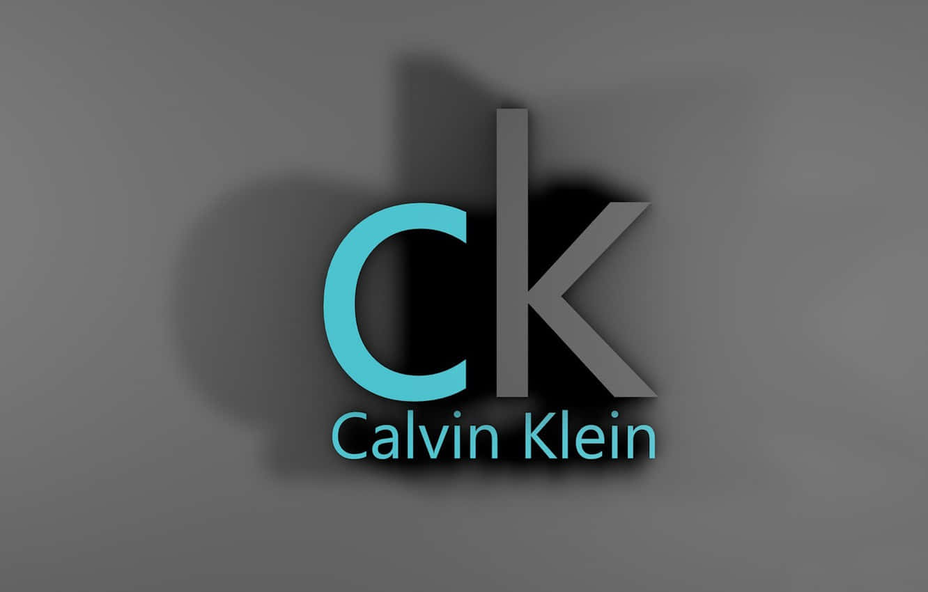 體驗風格、自信與自由，盡在Calvin Klein 壁紙 — 簡約Calvin Klein標誌，青綠色和灰色字母在漸變灰色背景上投射柔和陰影。