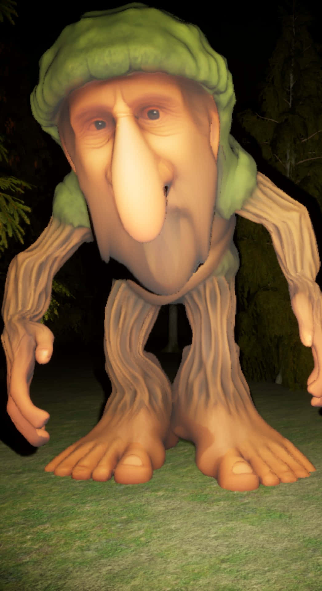  壁紙 — 一個卡通樹狀生物，戴著綠色帽子，四肢覆蓋樹皮，蹲在黑暗森林的草地上。