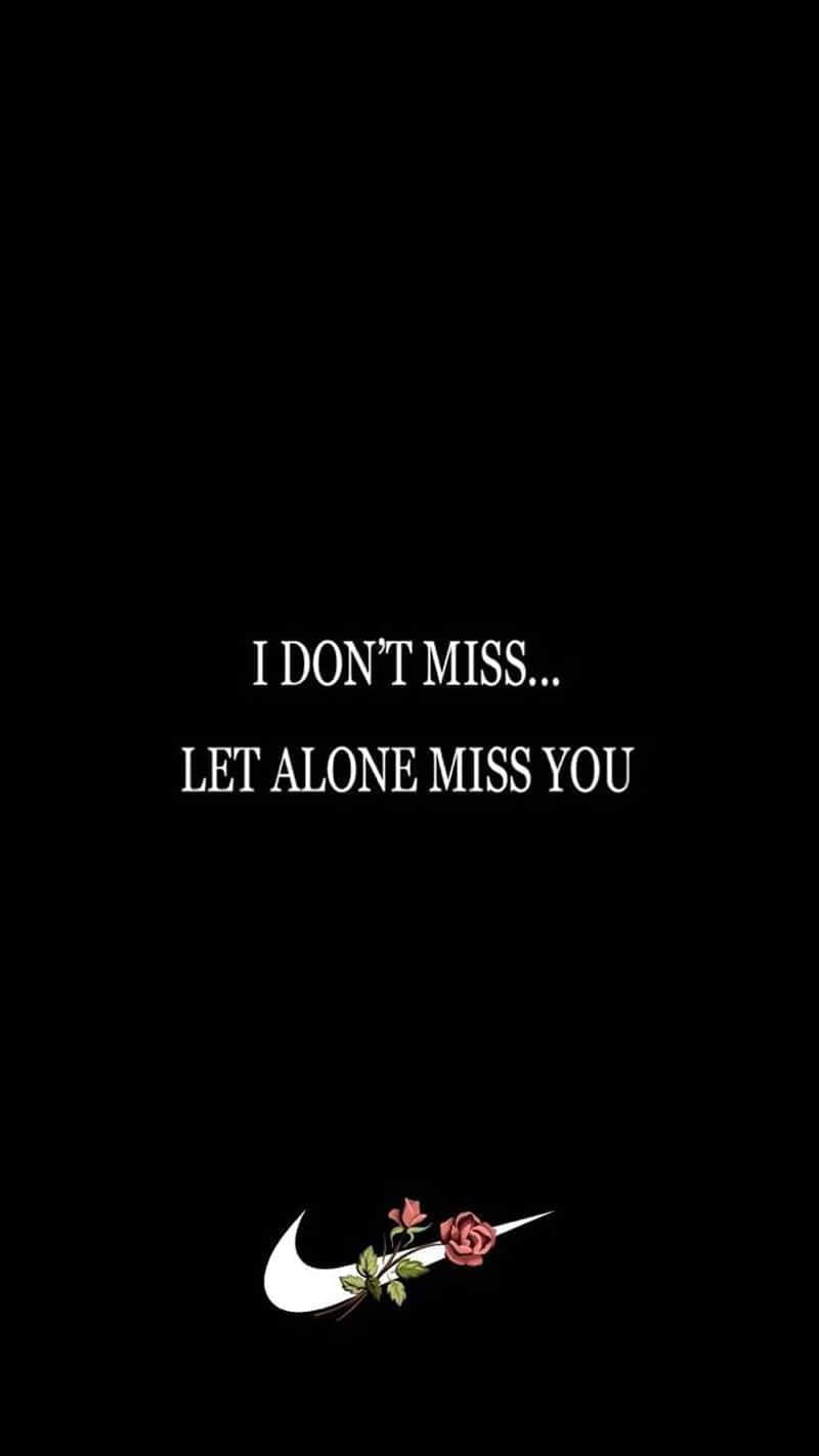文字引用 I DON'T MISS... LET ALONE MISS YOU，玫瑰在 Nike 勾勾內，黑色背景